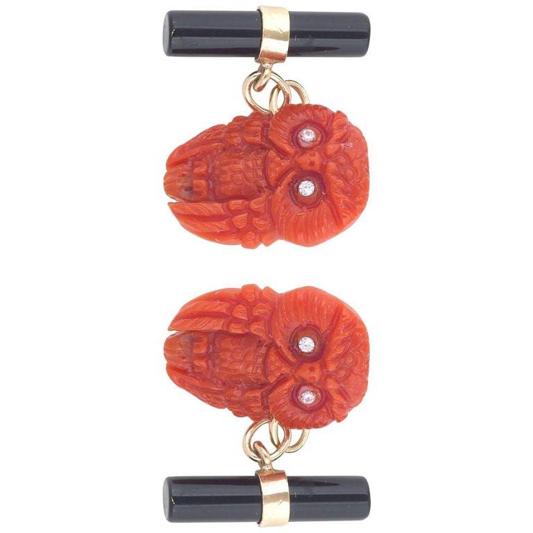 

Carved coral as an owl, with little diamonds as eyes, weight 3,5 g (each) height 2 cm (each).