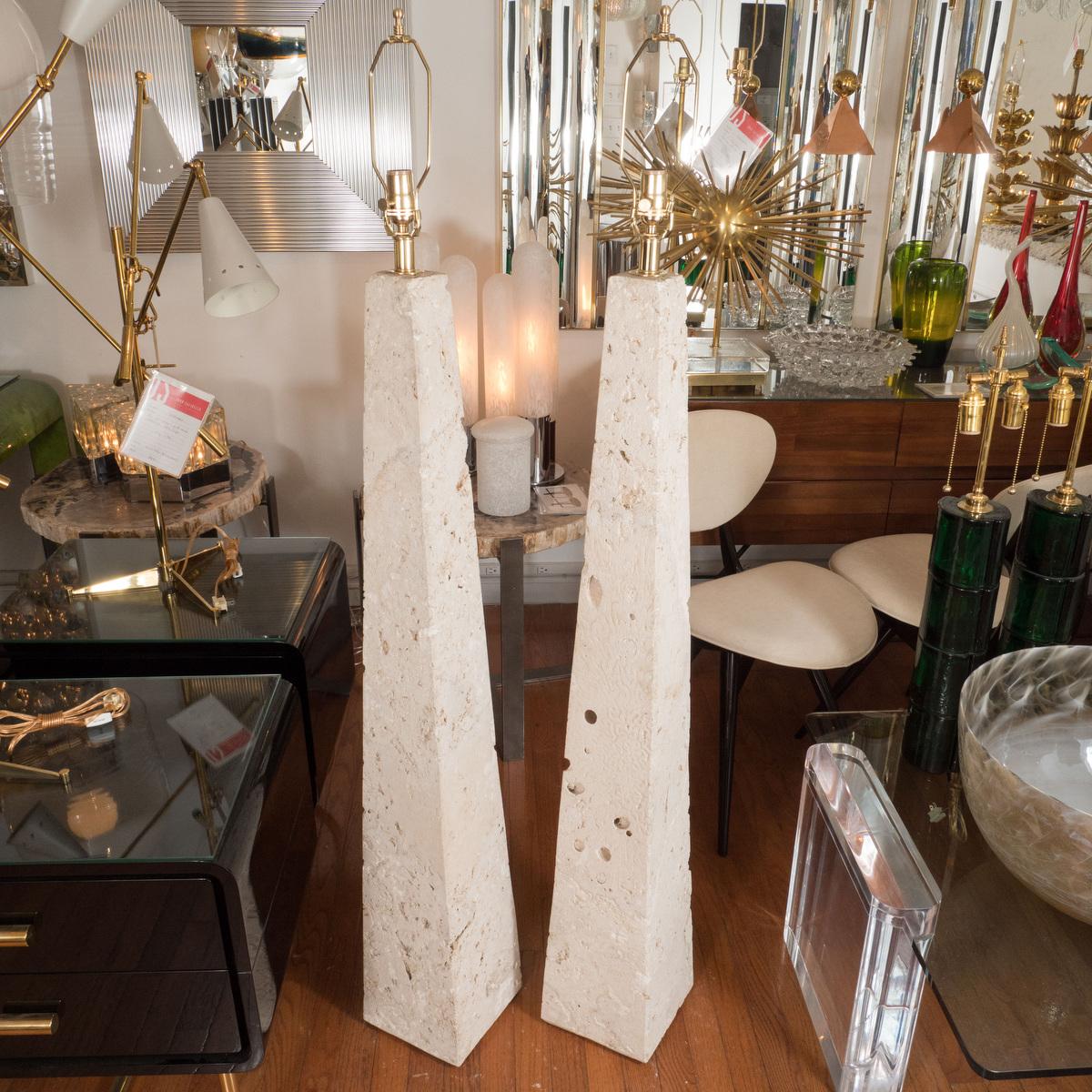 Pair of obelisk-form coral stone floor lamps.