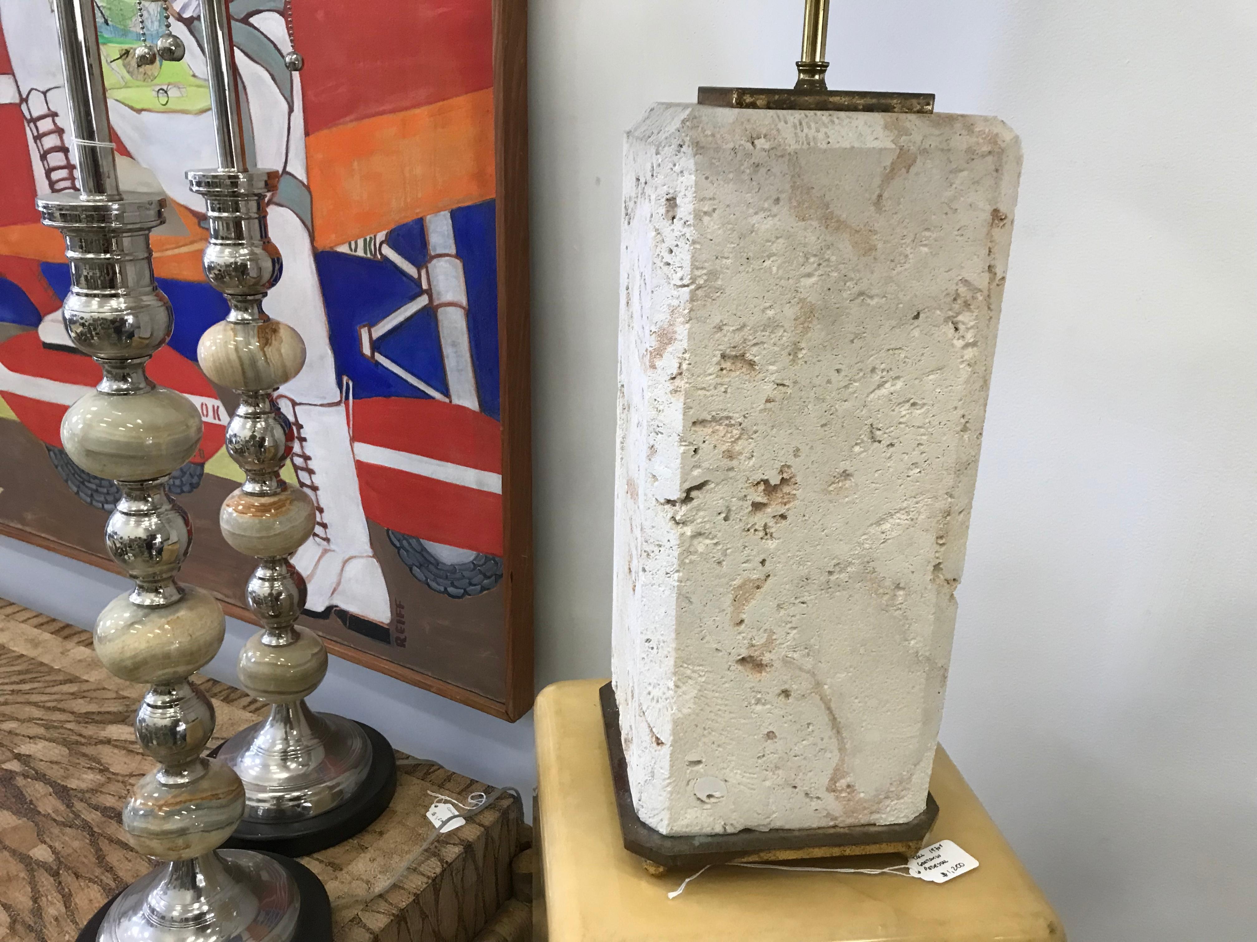 This is a great pair of coral lamps attributed to Karl Springer. The brass fittings are quite substantial. The brass has a lot of natural patina.