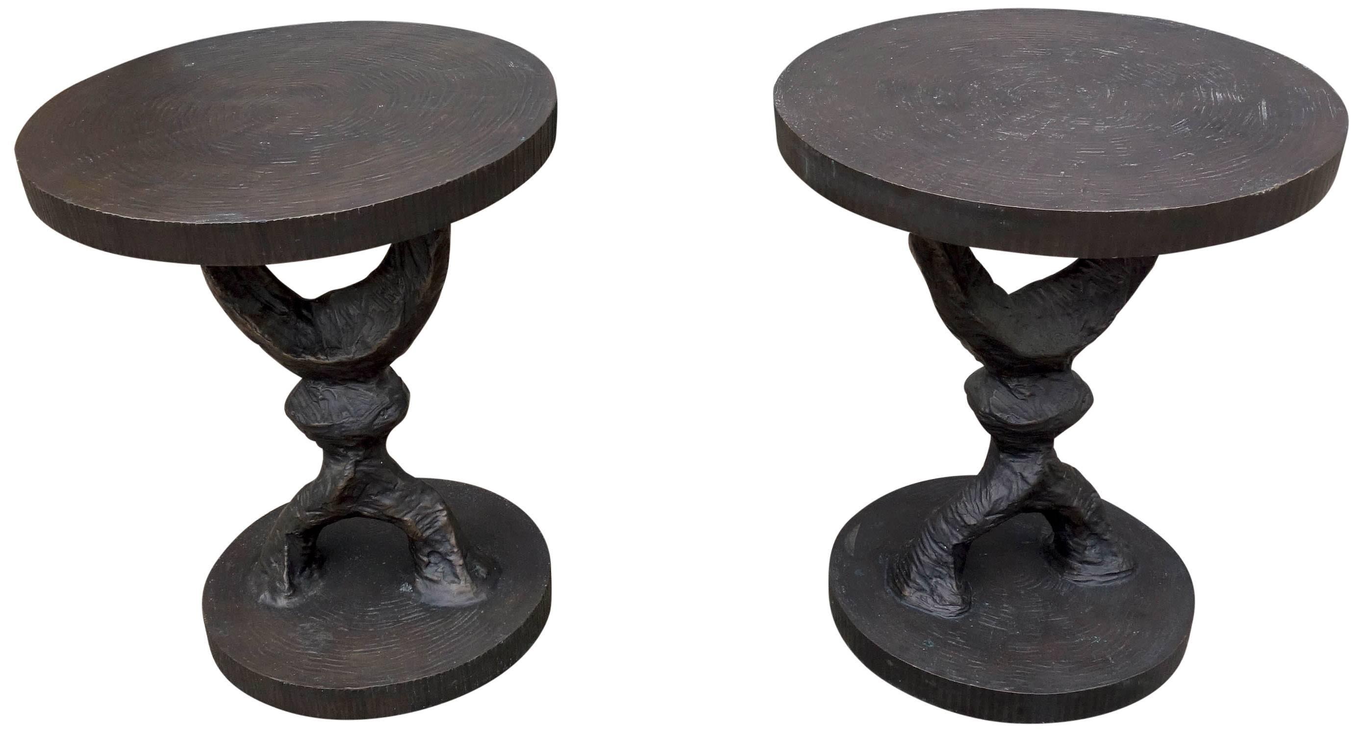 Tom Corbin designed crescent pedestal tables. Solid cast bronze with a natural patina. From midcentury to more traditional settings, these wonderfully sculpted tables exude strength and permanence that will add to any decor. You will appreciate the