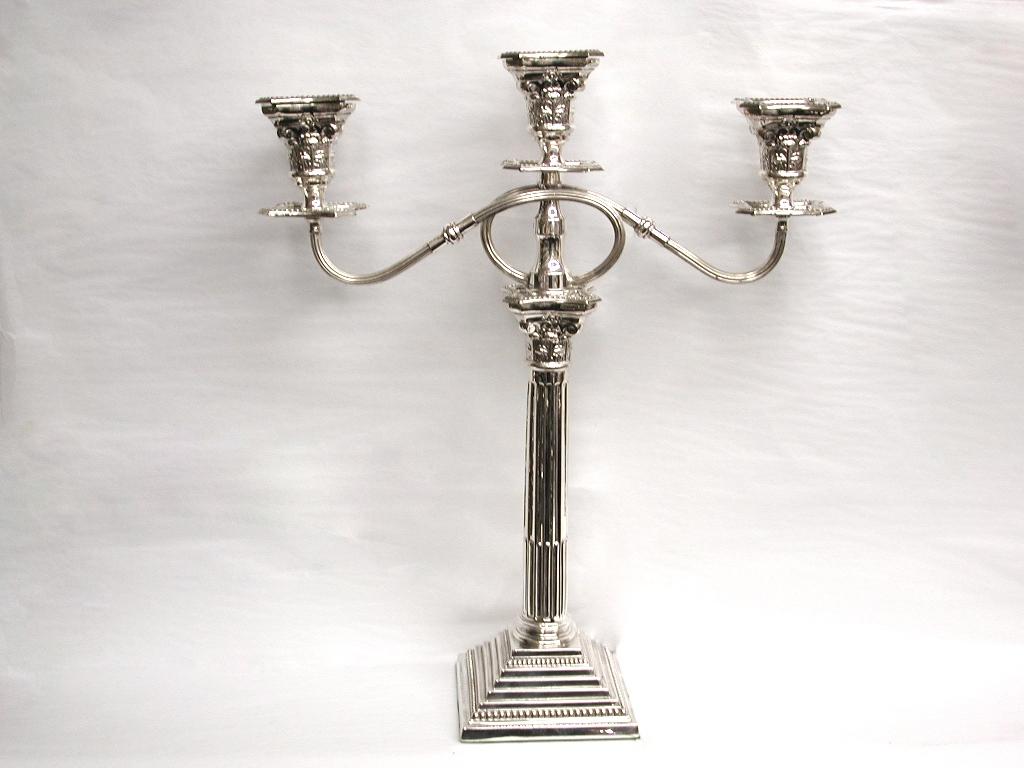 Pair of Corinthian column 3 light silver candelabra, Birmingham, 1932
Made by Britton, Gould and Co.
Very good definition, no visible signs of wear.
     