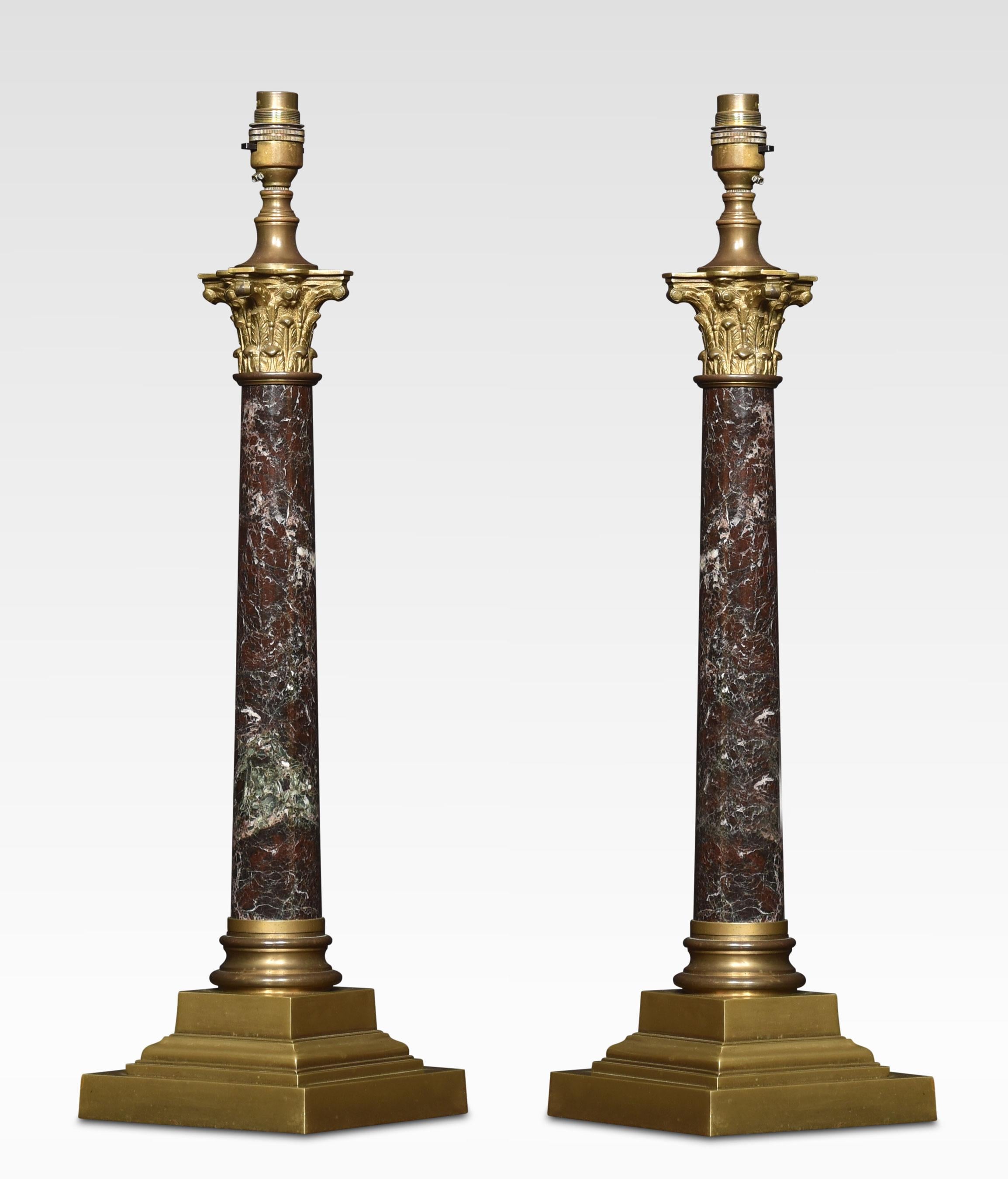 Pair of brass and marble table lamps the corinthian column tops above circular marble stems. All raised up on stepped base. The lamps have been rewired. Lampshades are not included.
Dimensions
Height 23 Inches
Width 6 Inches
Depth 6 Inches.