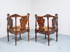 Coppia di poltrone angolari di Ernesto Basile