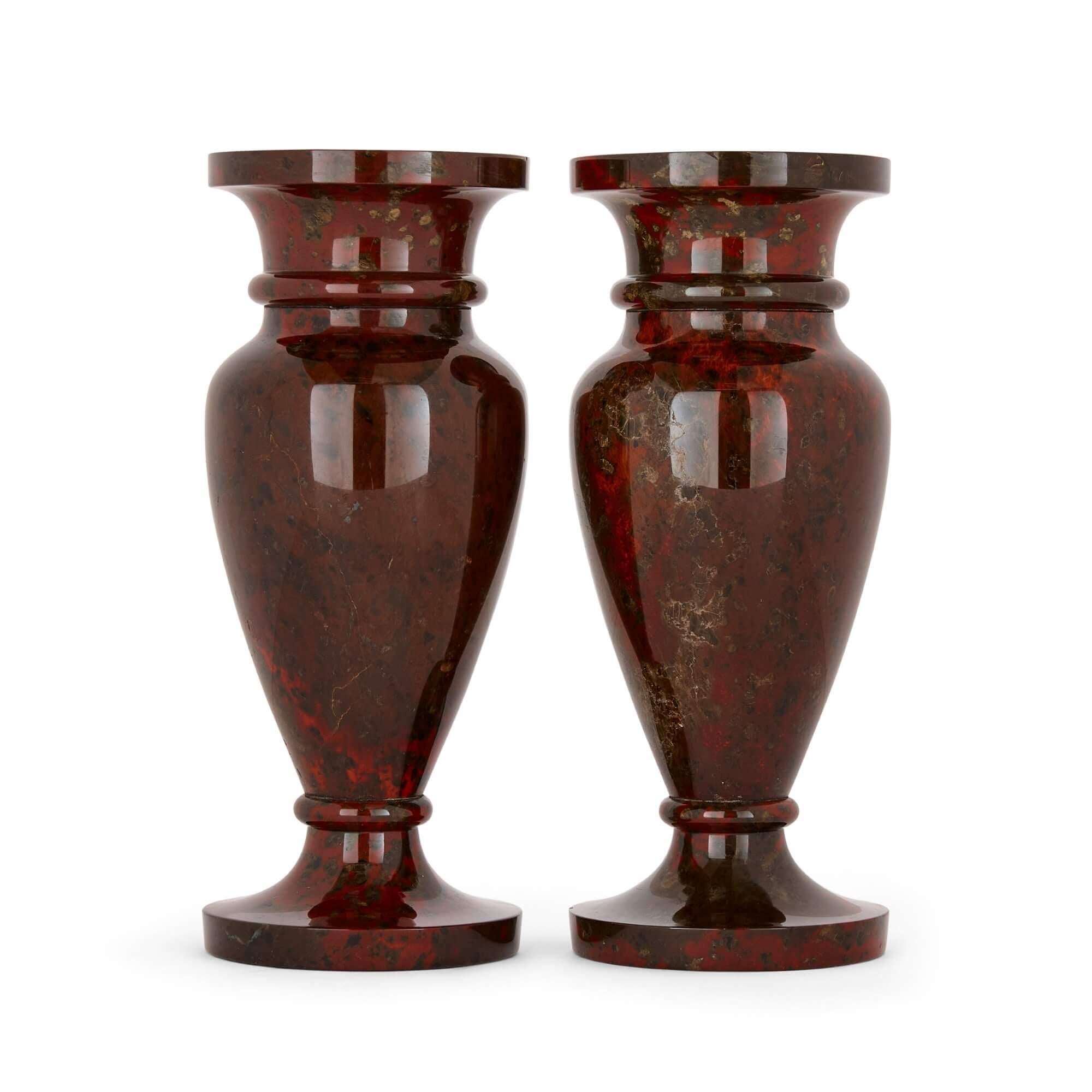 Pair of Cornish Serpentine stone urn vases
English, 20th Century
Height 20.5cm, diameter 8cm

This pair of very interesting vases is crafted from very fine Cornish serpentine, a beautiful stone found at the Southern point of the Lizard peninsula in