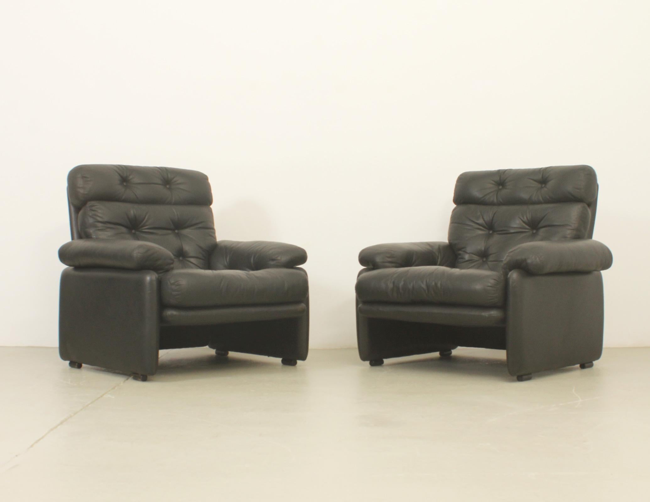 Pair of Coronado armchairs with high backrest designed in 1966 by Tobia Scarpa for B & B Italia. Upholstered in original black leather. 