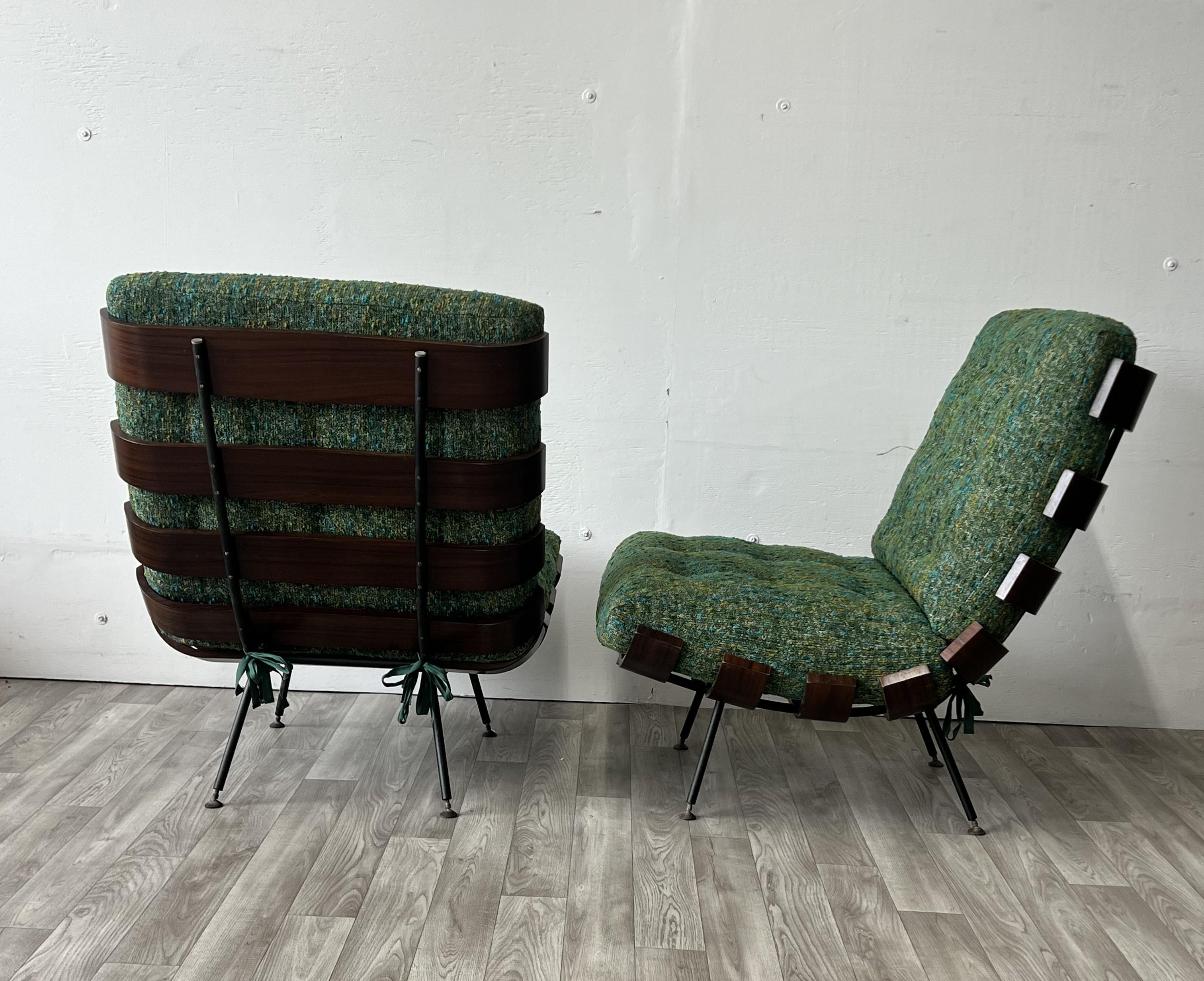 Pair of Costela Lounge Chairs made out of wood with metal legs
Comes with reupholstered cushions
Very good condition
Carlo Hauner and Martin Eisler for Forma
Brazil 1950s,
