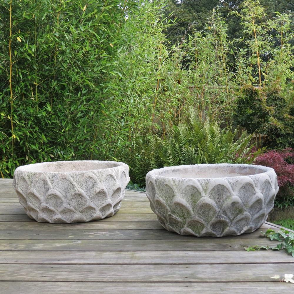 Pair of solid concrete garden planters. Good condition, nicely patinated.
Stamped to the inside Cotstone

ST1257.