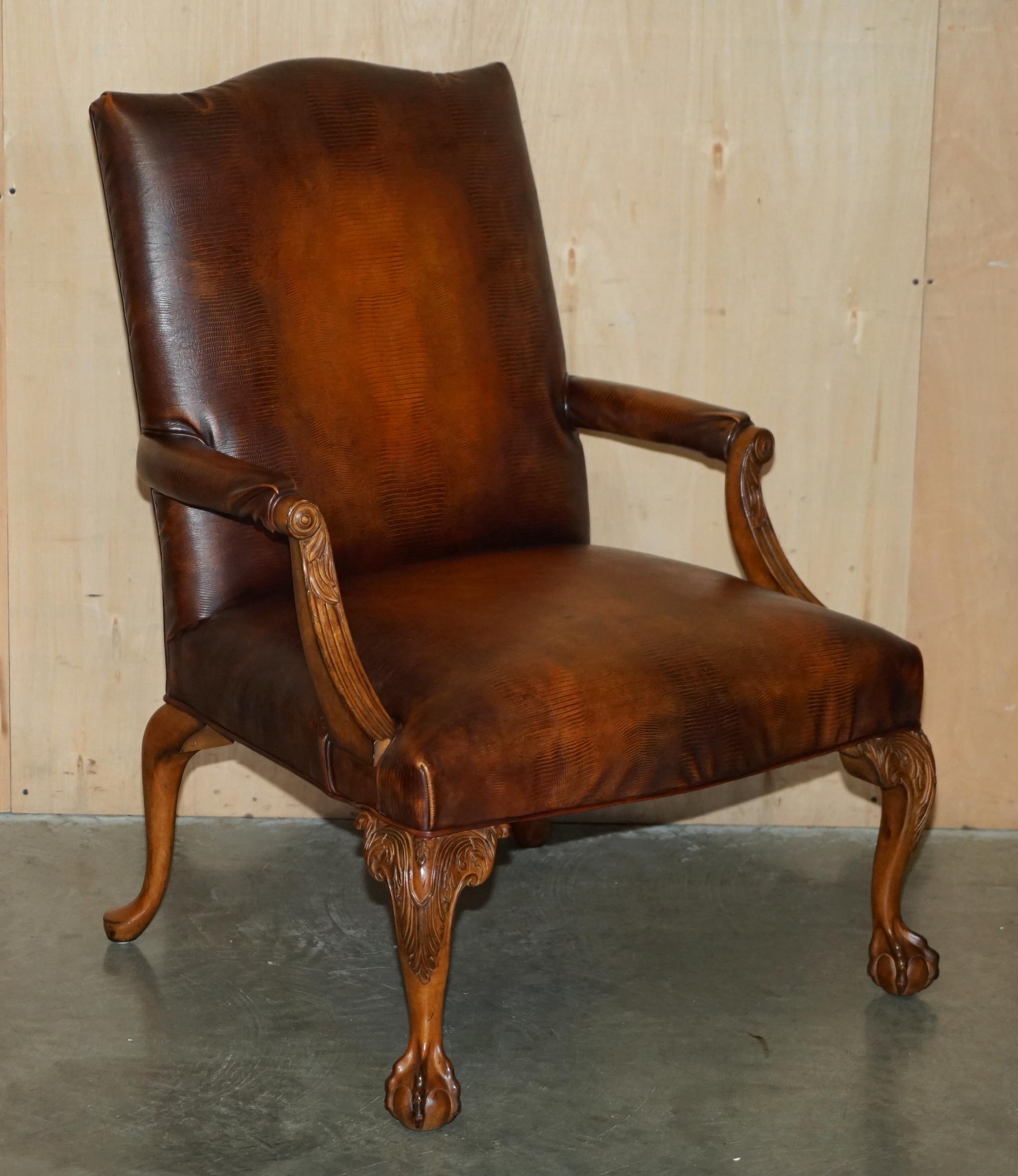 Royal House Antiques

Royal House Antiques is delighted to offer for sale this stunning pair of USA made Counchill Contract hand dyed brown leather Library armchairs with ornately carved Claw & Ball Cabriolet lets and Alligator or Crocodile patina