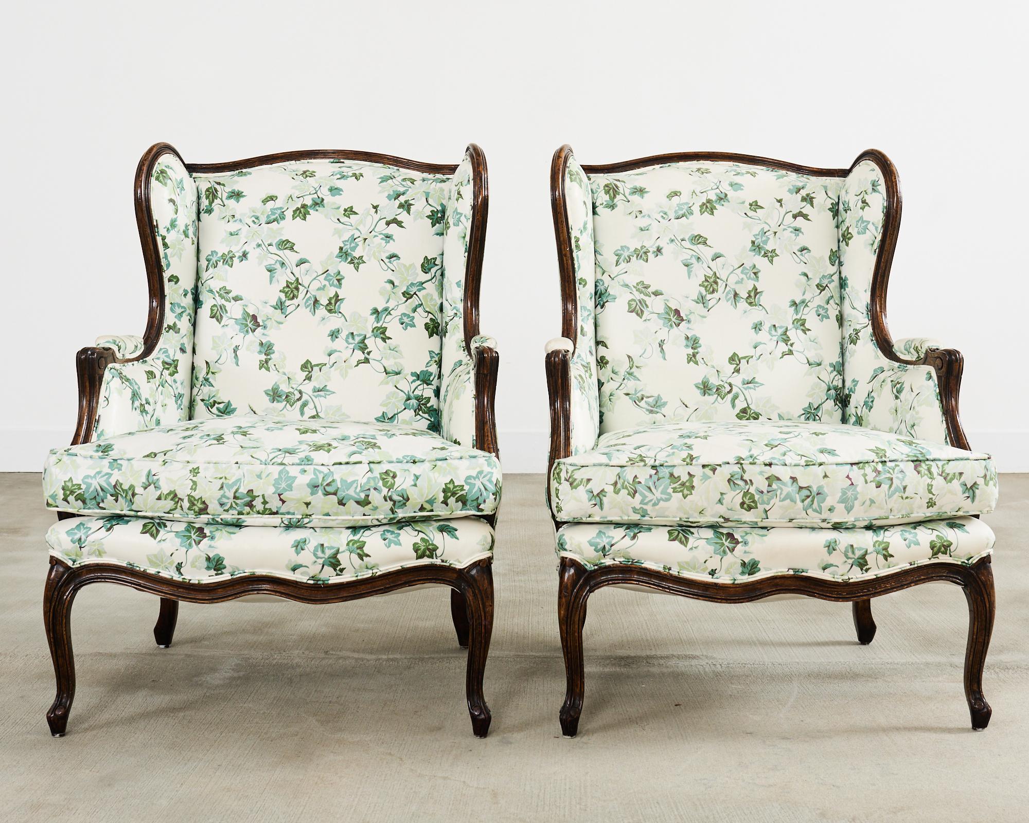 Hand-Crafted Pair of Country French Provincial Walnut Botanical Wingback Chairs For Sale
