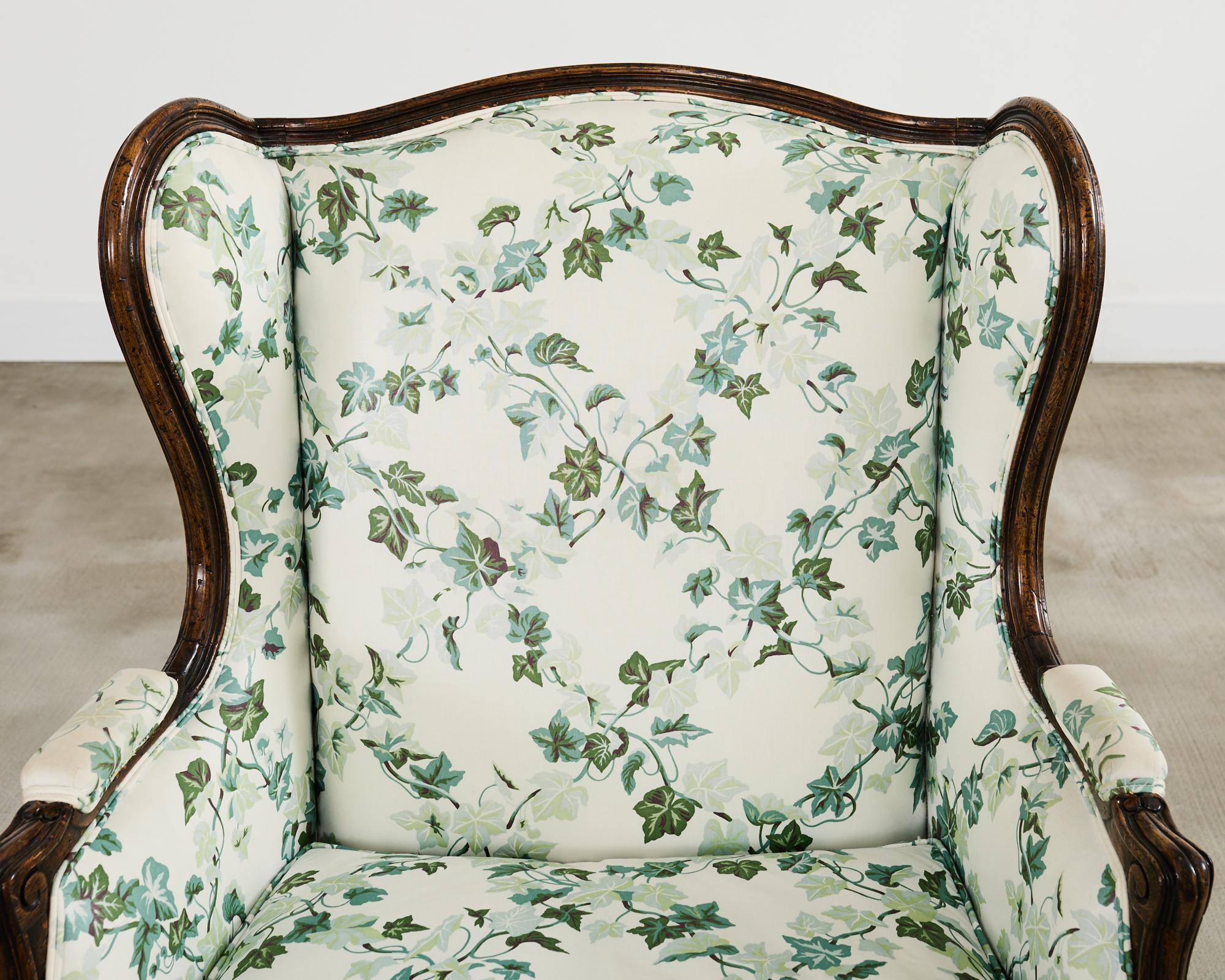 20th Century Pair of Country French Provincial Walnut Botanical Wingback Chairs For Sale
