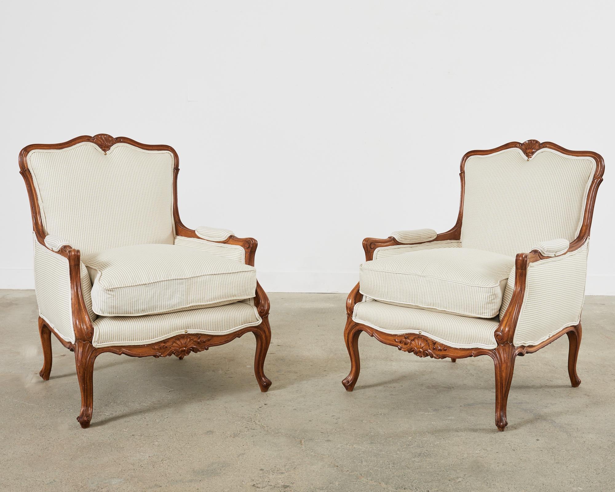 Hand-Crafted Pair of Country French Provincial Walnut Carved Armchairs For Sale