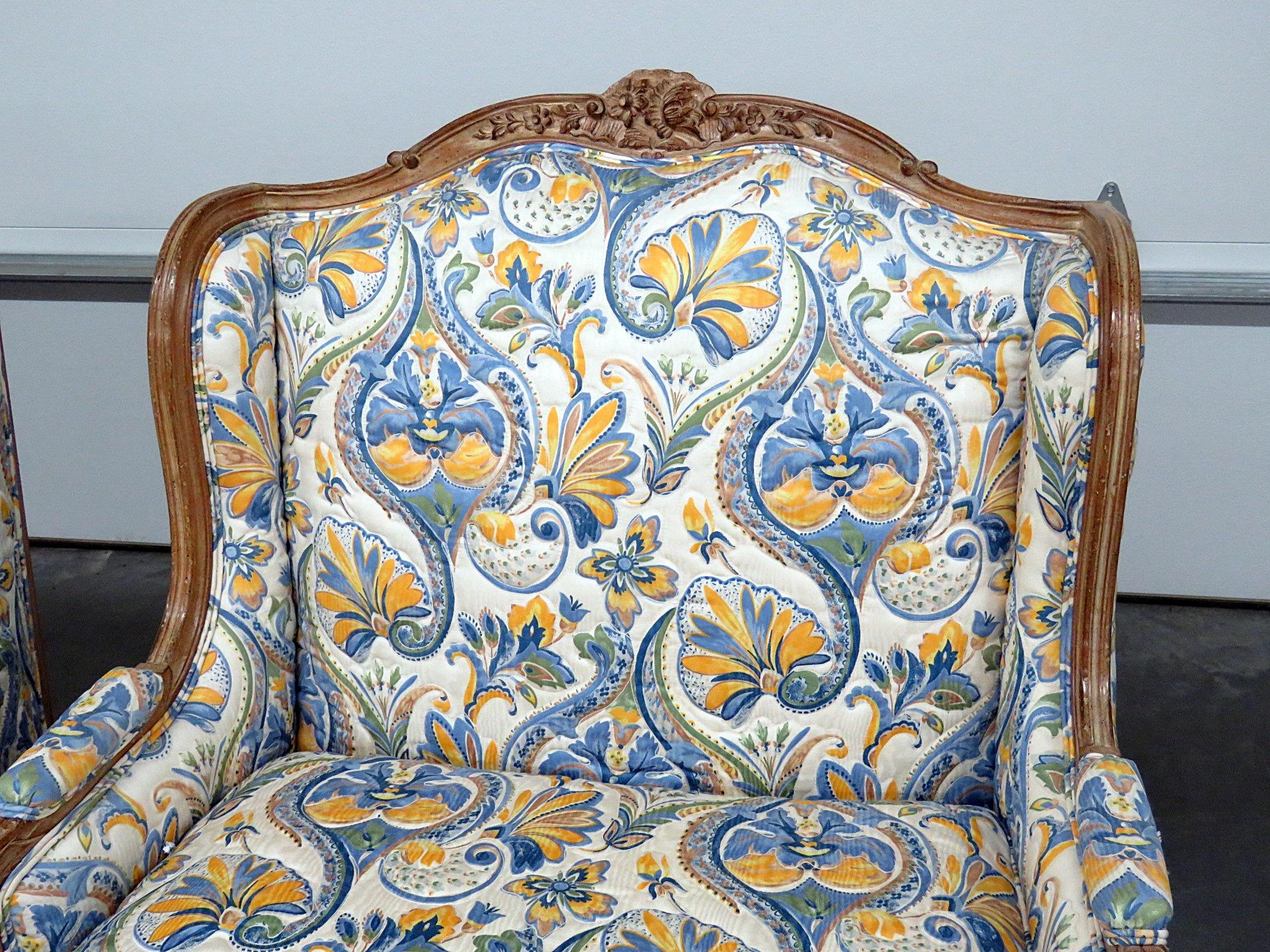 20th Century Pair of Country French Style Wingback Chairs and Ottomans