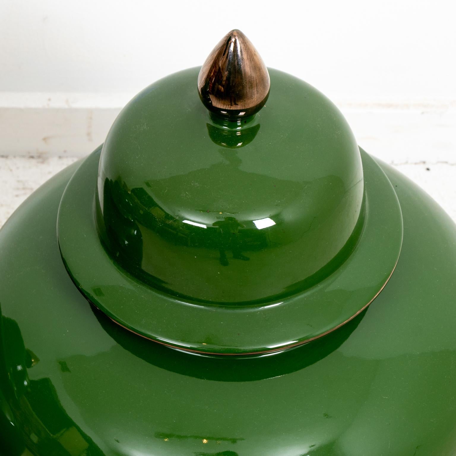 20th Century Pair of Covered Green Painted Temple Jars with Lids For Sale