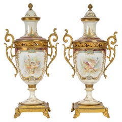 Pair of Covered Vases in Sèvres Porcelain and Gilt Bronze, Napoleon III Period. Pair of Covered Vases in Sèvres Porcelain and Gilt Bronze, Napoleon III Period.