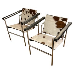 Pair Of Cow Hide Armchair With Tilting Back By Le Corbusier