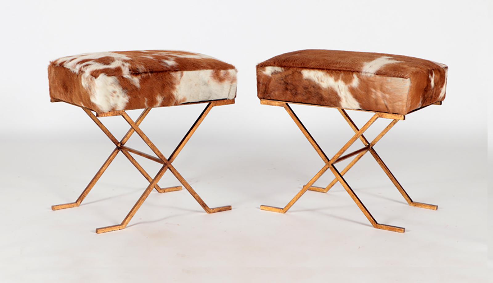 Pair gilt-iron cowhide x-frame benches in the Jean-Michel Frank Manner