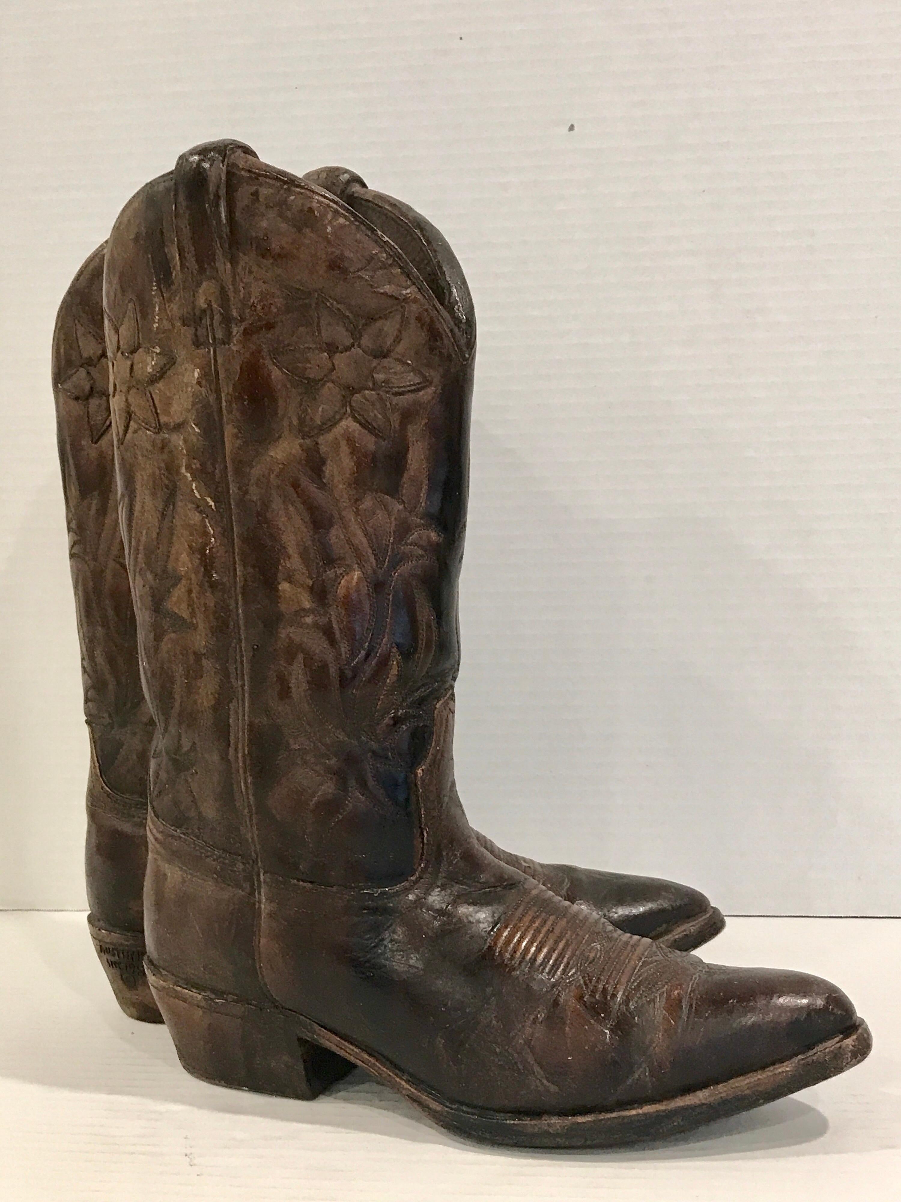 A pair of cowboy boots sculpture / trade sign, realistically modeled, polychromed with incised decoration.