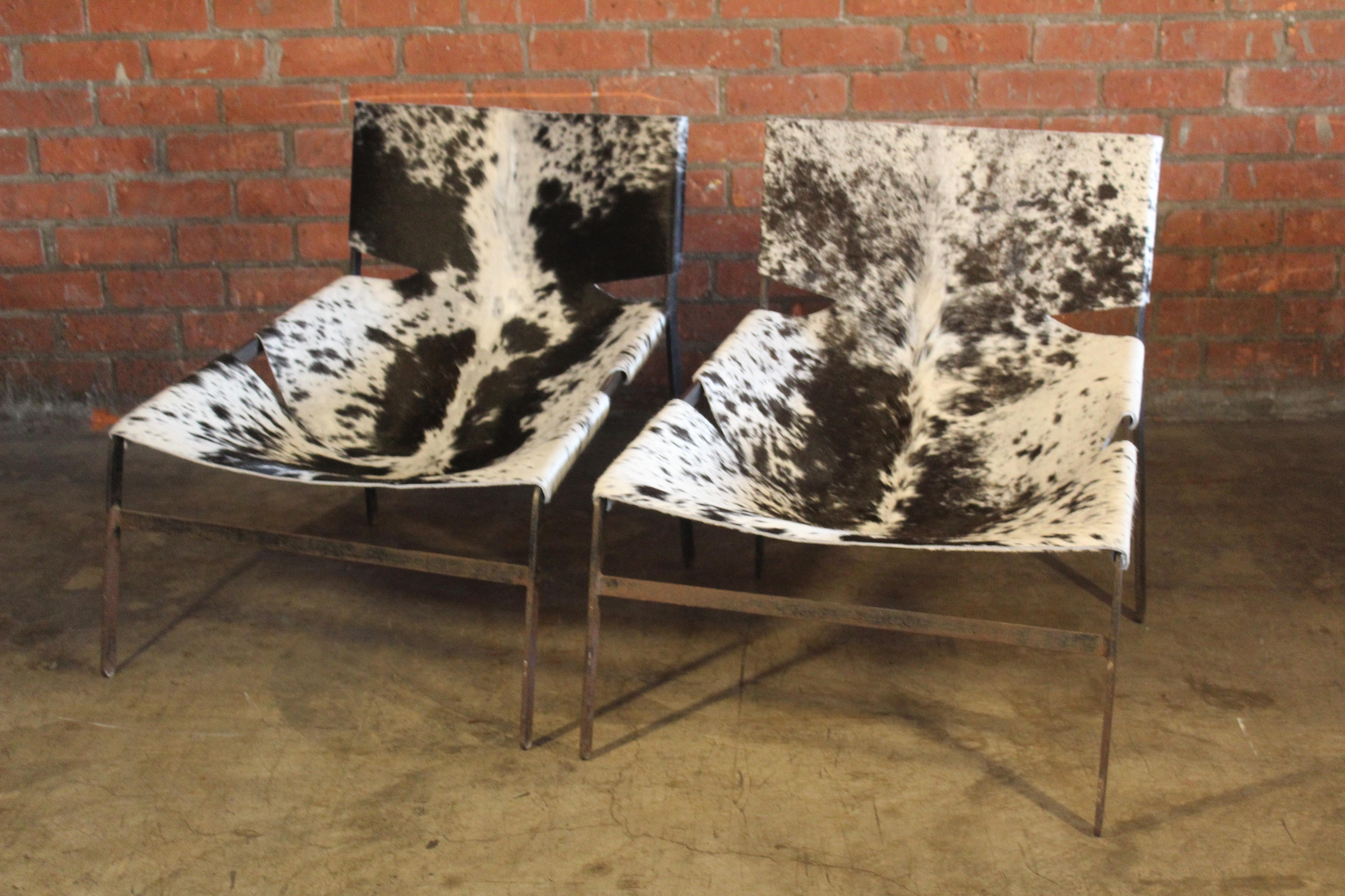Mid-20th Century Pair of Cowhide and Iron Sling Chairs, Netherlands, 1960s For Sale