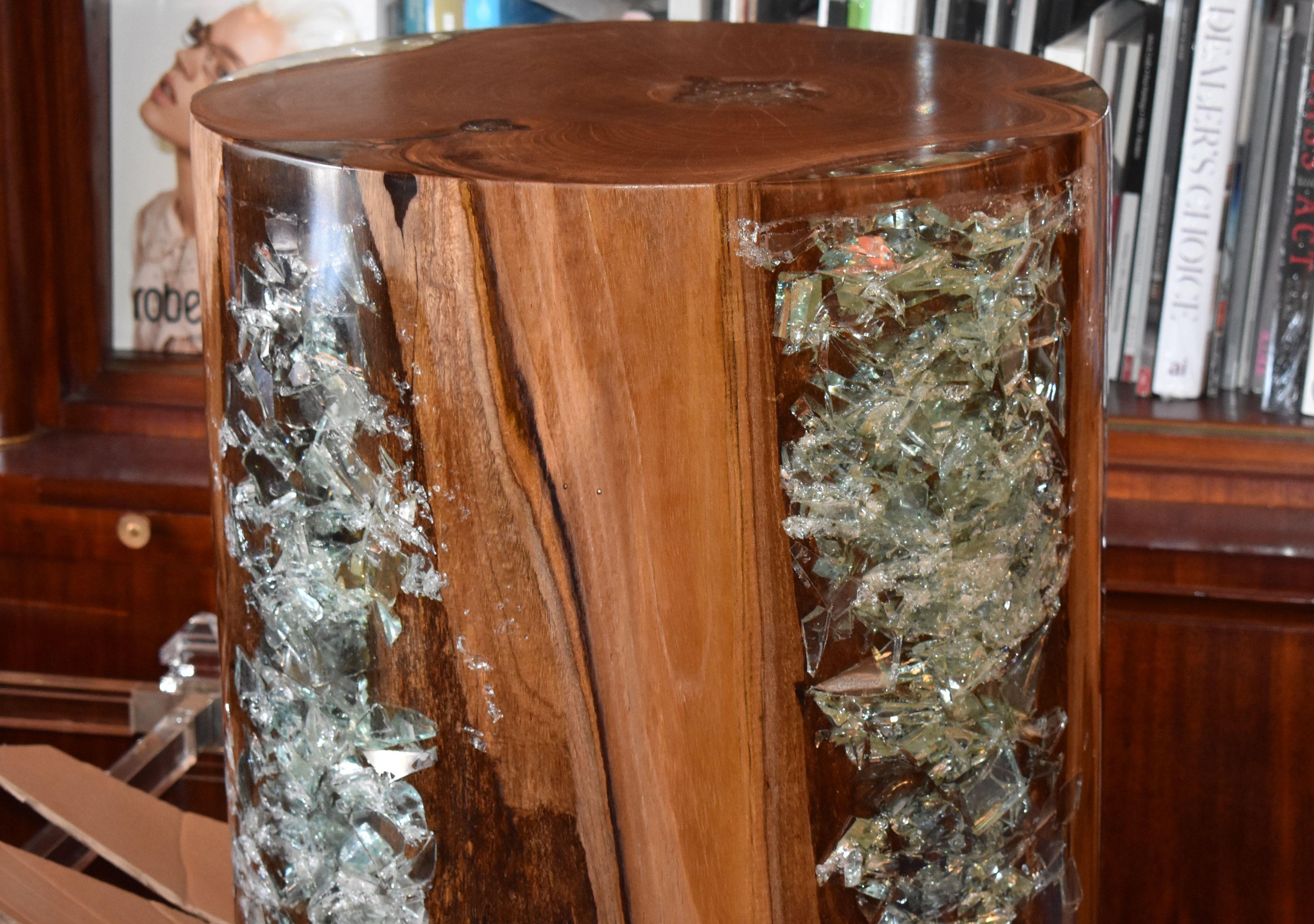 Pair of round side tables made of teak wood and resin. Each table is unique.