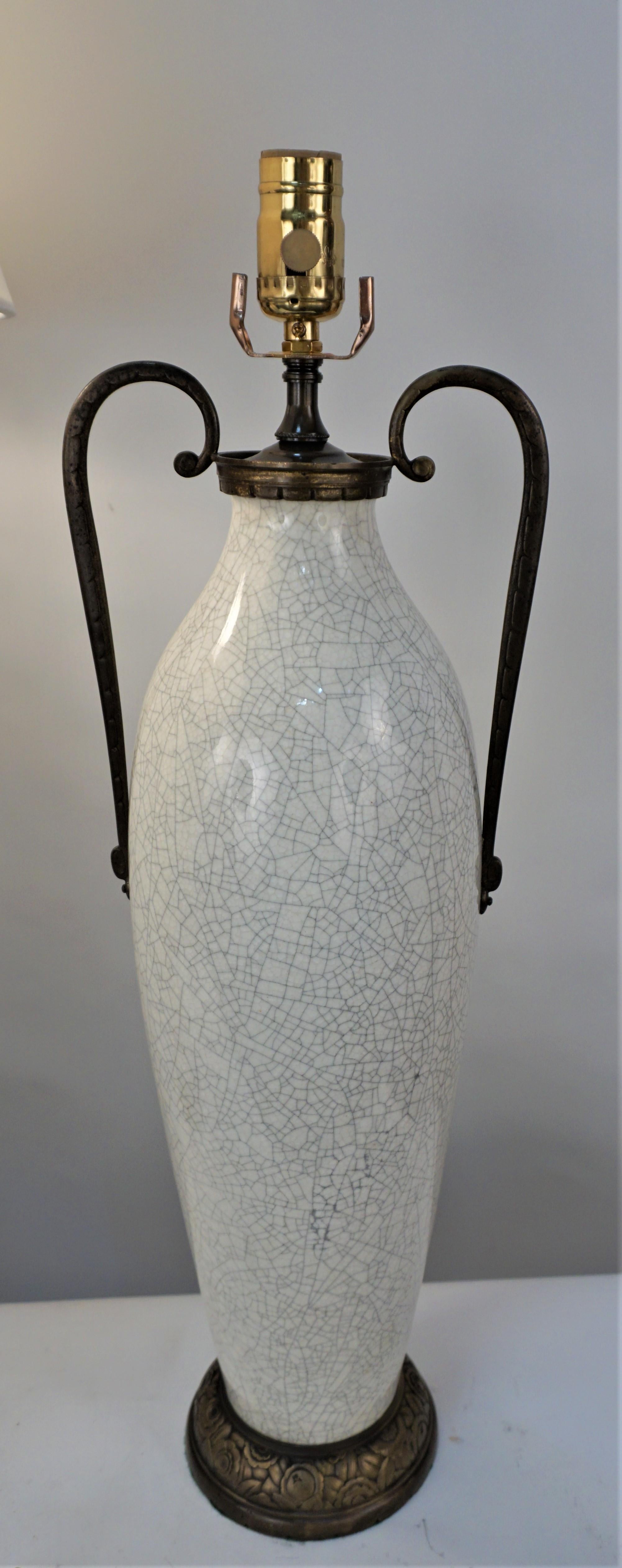 Pair of crackle ceramic vase with bronze base and top table lamp fitted with hardback silk lampshade.