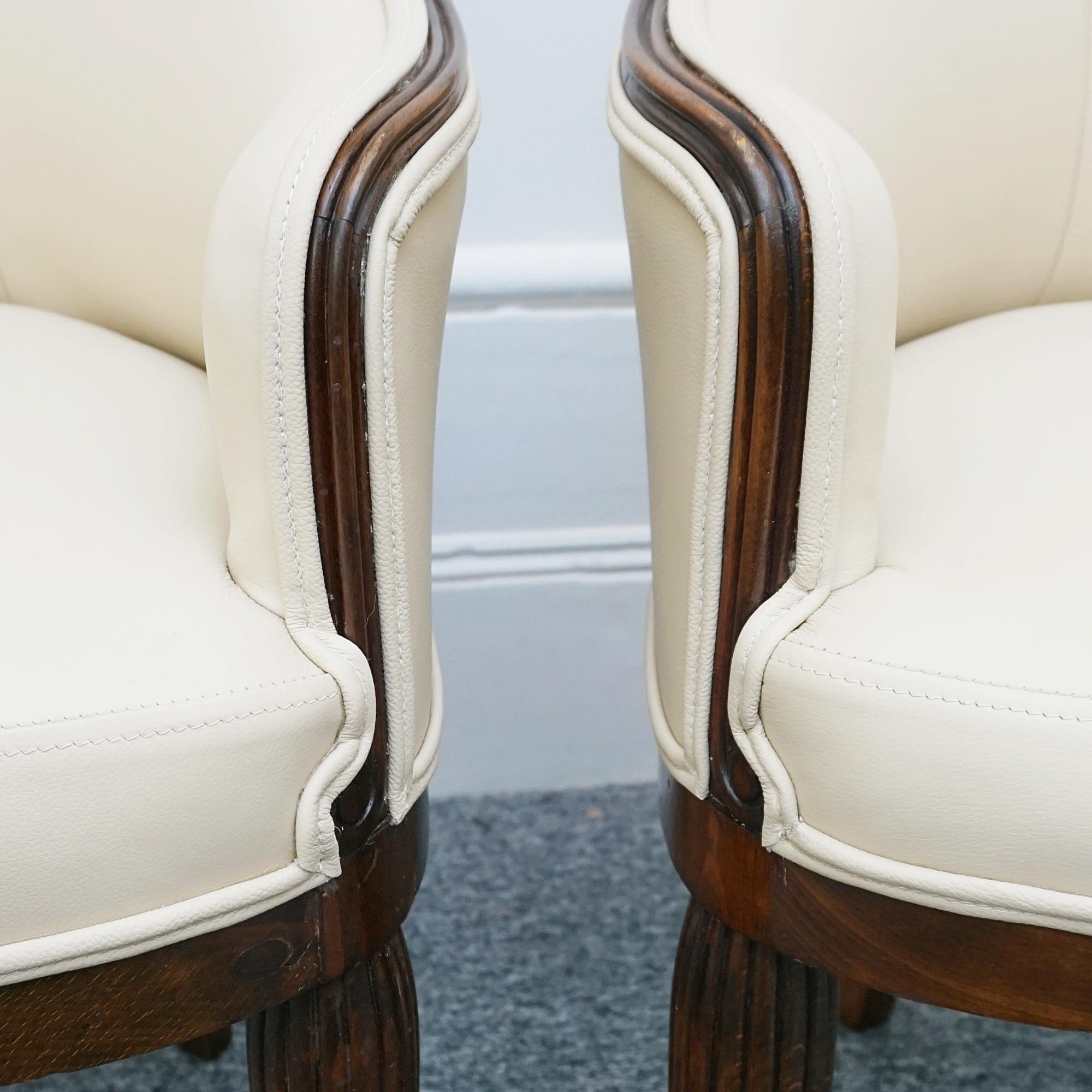 Early 20th Century Pair of Cream Leather Upholstered French Art Deco Tub Chairs