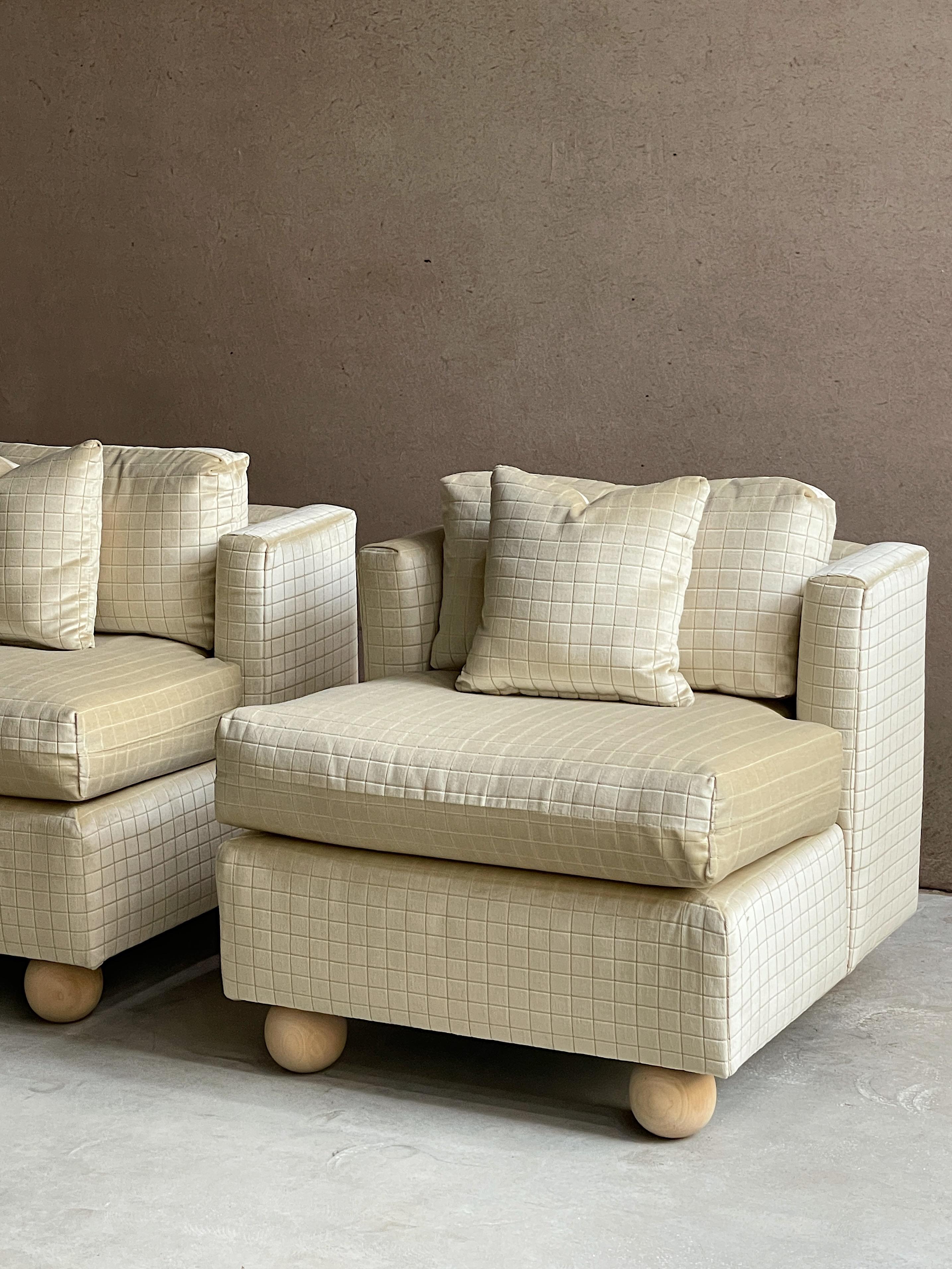 1960s chair recently upholstered in cream tiled mohair. We've updated the feet with a dramatic 5