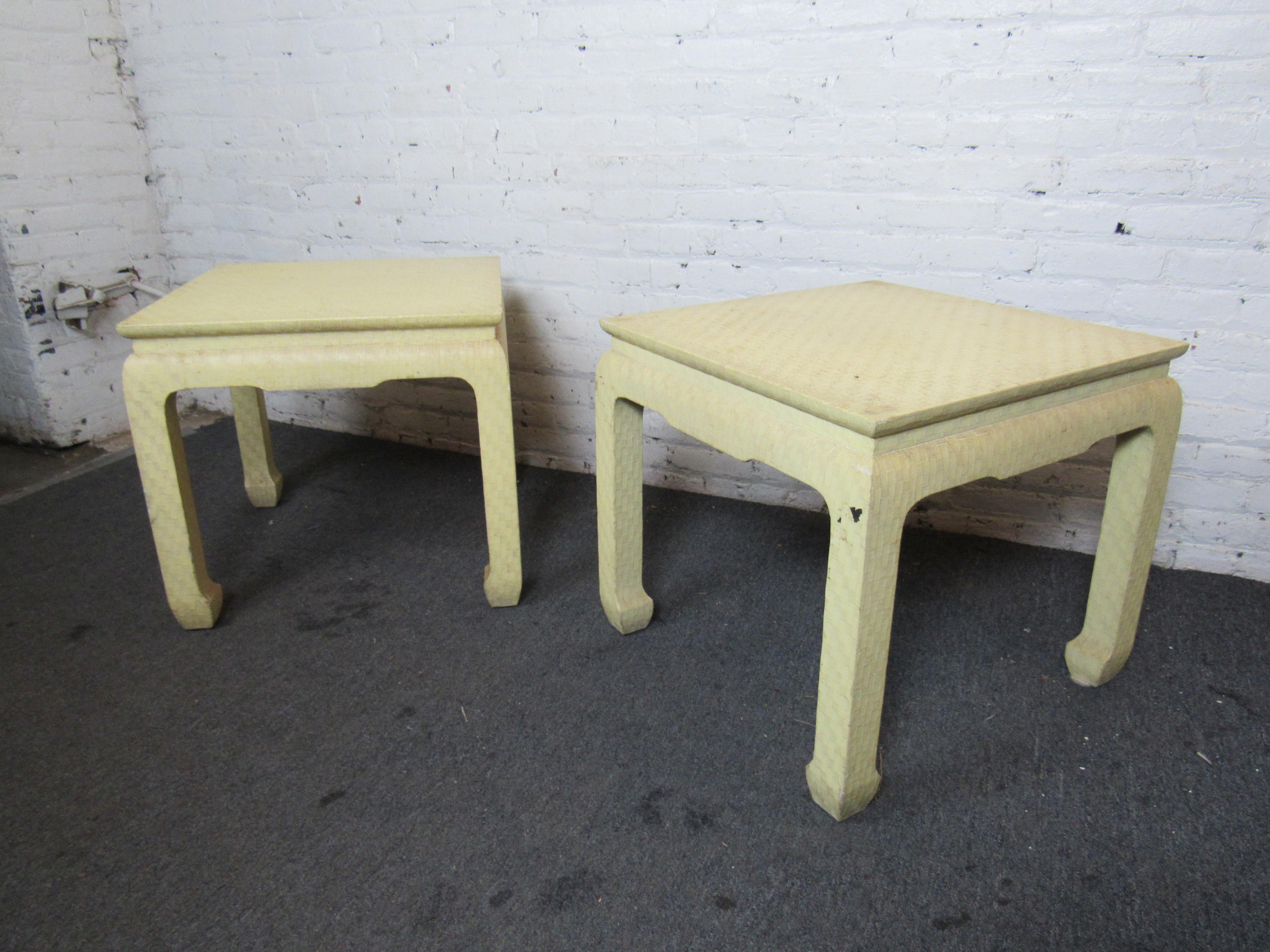 With a unique textured surface and understated cream color, this pair of vintage side tables by Baker Furniture is perfect for adding Mid-Century style to any interior.