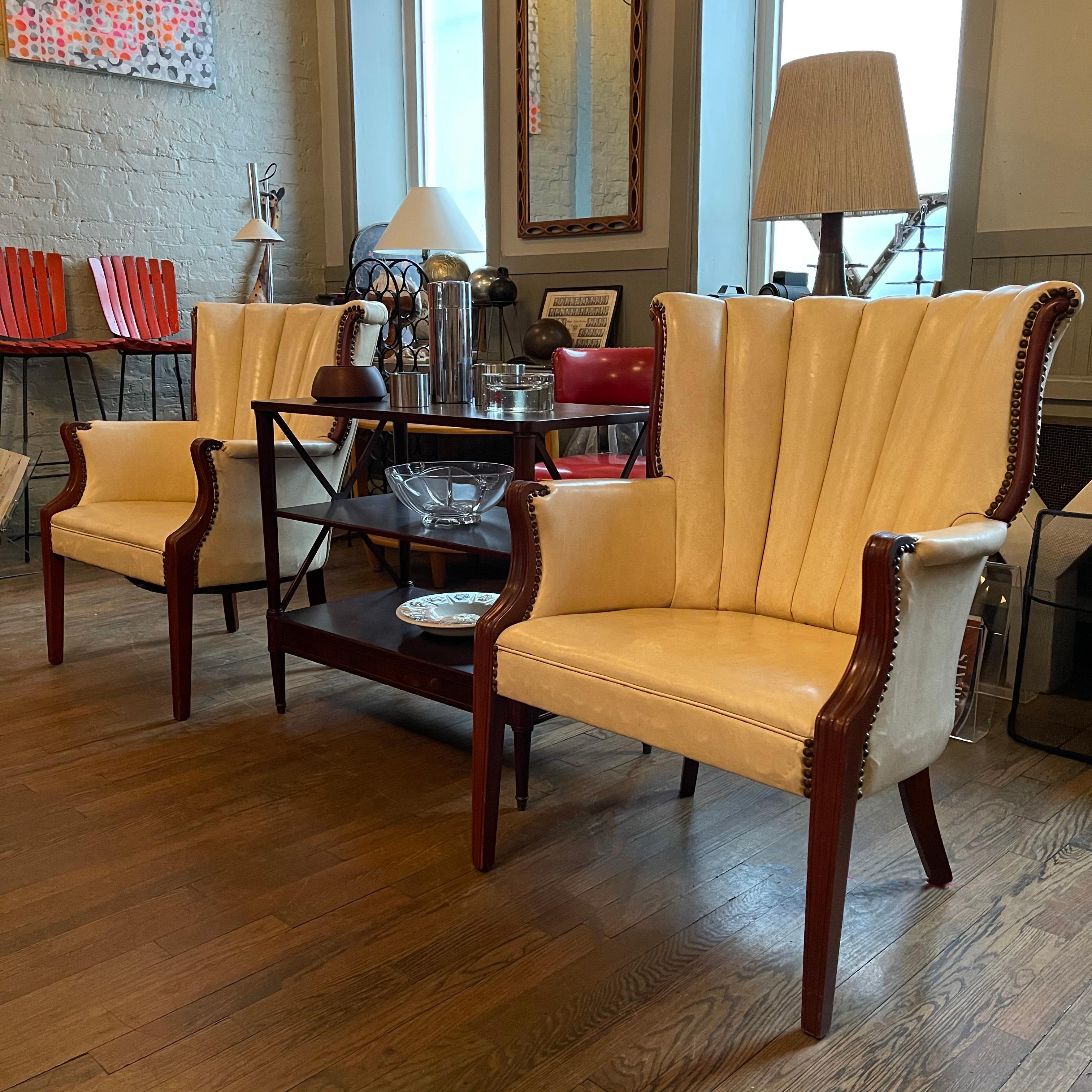 20th Century Pair of Cream Vinyl Mahogany Wingback Armchairs