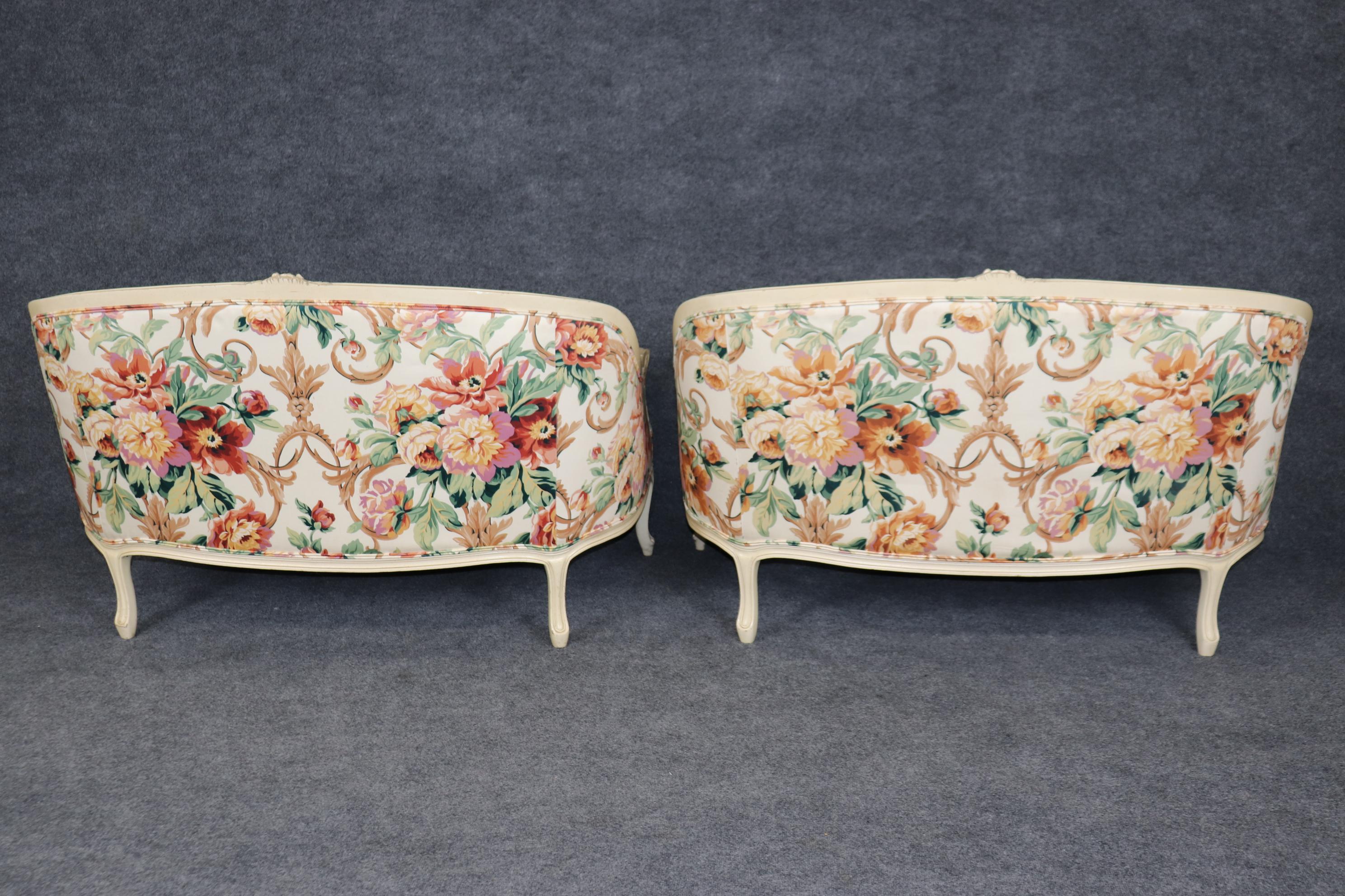 Pair of Creme Paint Decorated Floral Upholstered French Louis XV Settees In Good Condition For Sale In Swedesboro, NJ