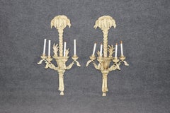 Pareja de palmatorias pintadas a la crema Pareja de candelabros franceses Jansen Roche