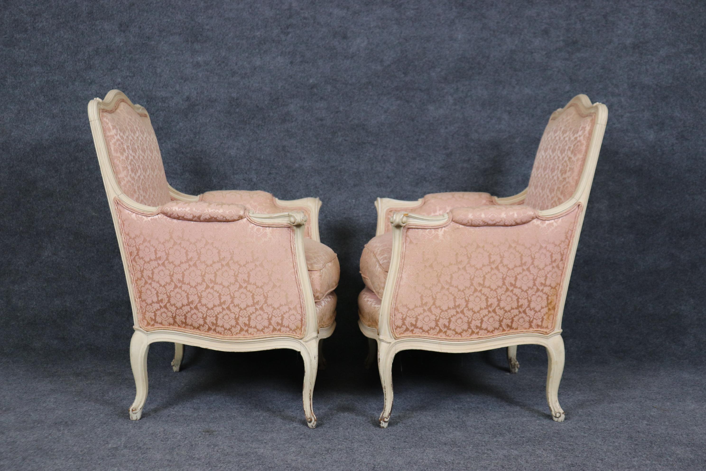 Mid-20th Century Pair of Creme Painted Rose Blush Hued French Louis XV Bergere Chairs