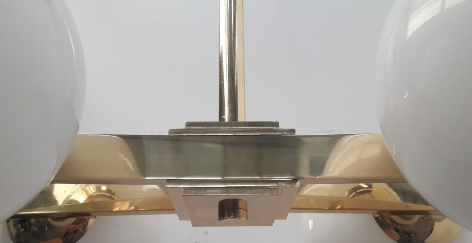 Pair of Cresta Chandeliers in the style of Arredoluce. Italy, 1970's. In Excellent Condition For Sale In Los Angeles, CA