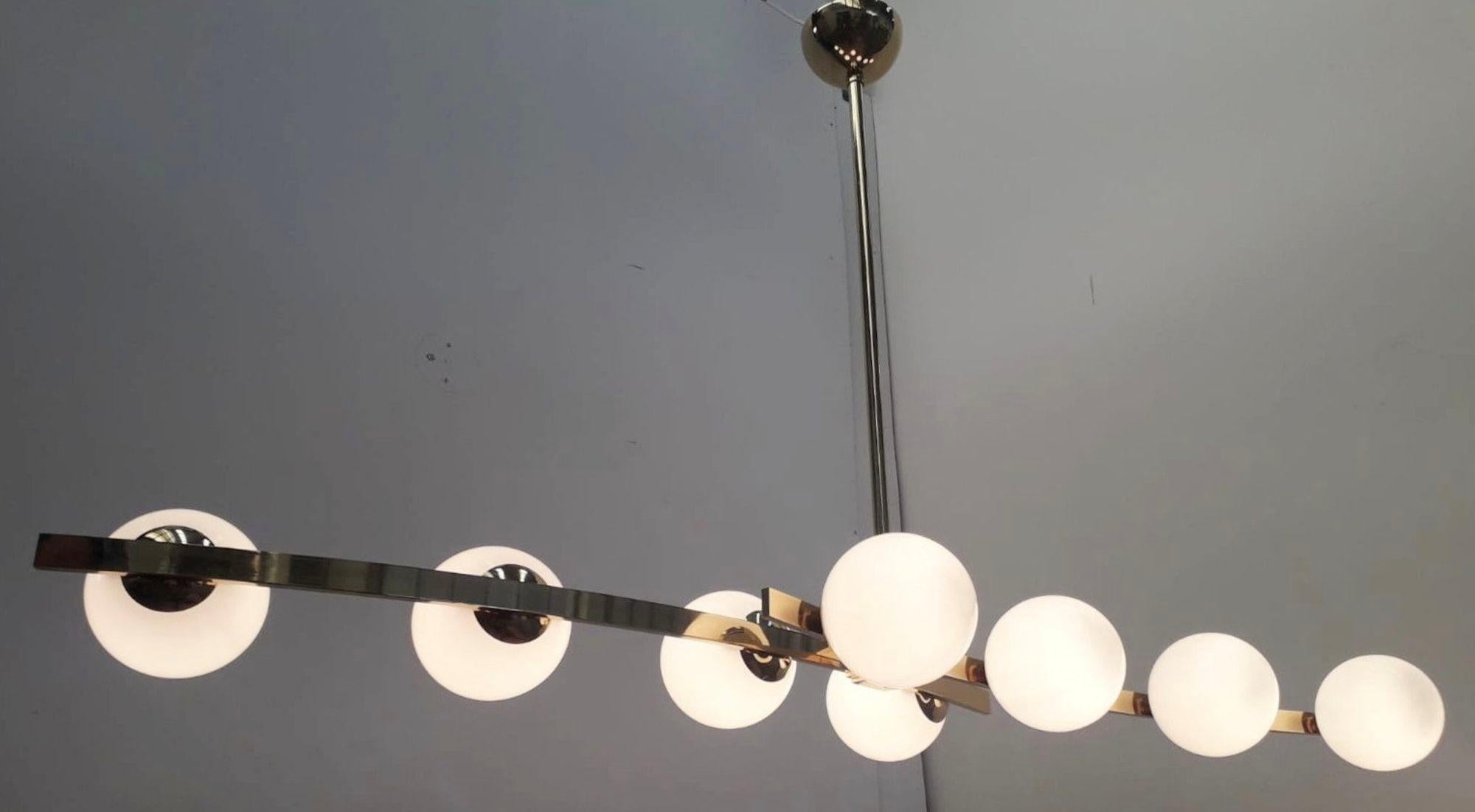 Late 20th Century Pair of Cresta Chandeliers in the style of Arredoluce. Italy, 1970's. For Sale