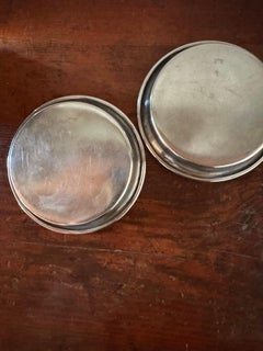 Pair of Cristofle French wine silverplate wine coasters