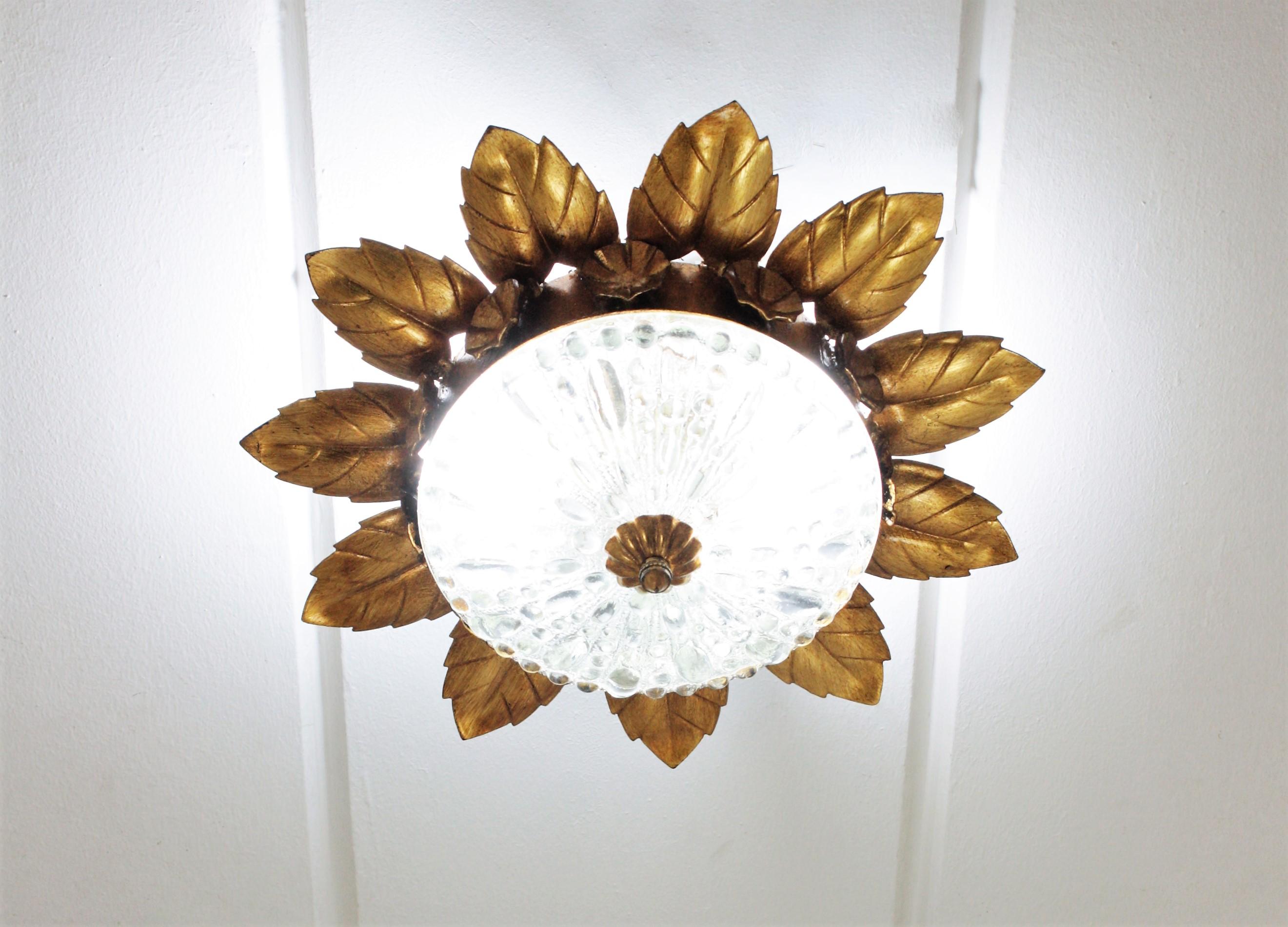 Pair of Sunburst Crown Flower Flush Mounts in Gilt Metal and Pressed Glass For Sale 1