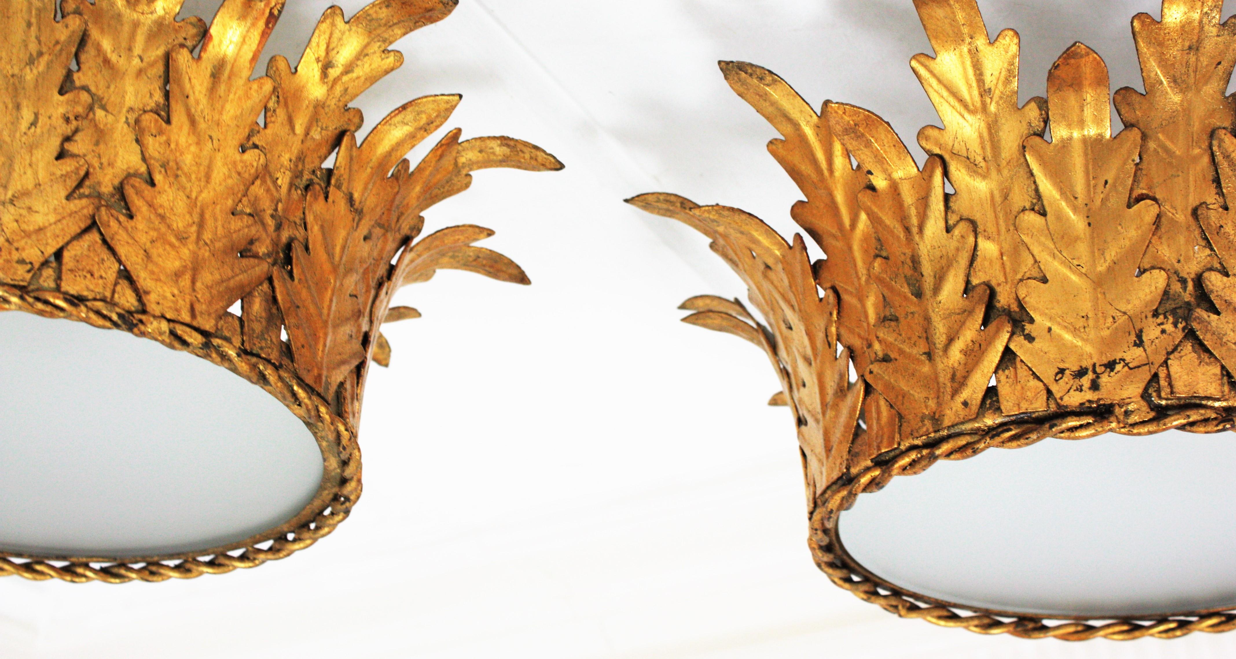 Pair of Crown Foliage Ceiling Light Fixtures in Gilt Iron and Frosted Glass 7
