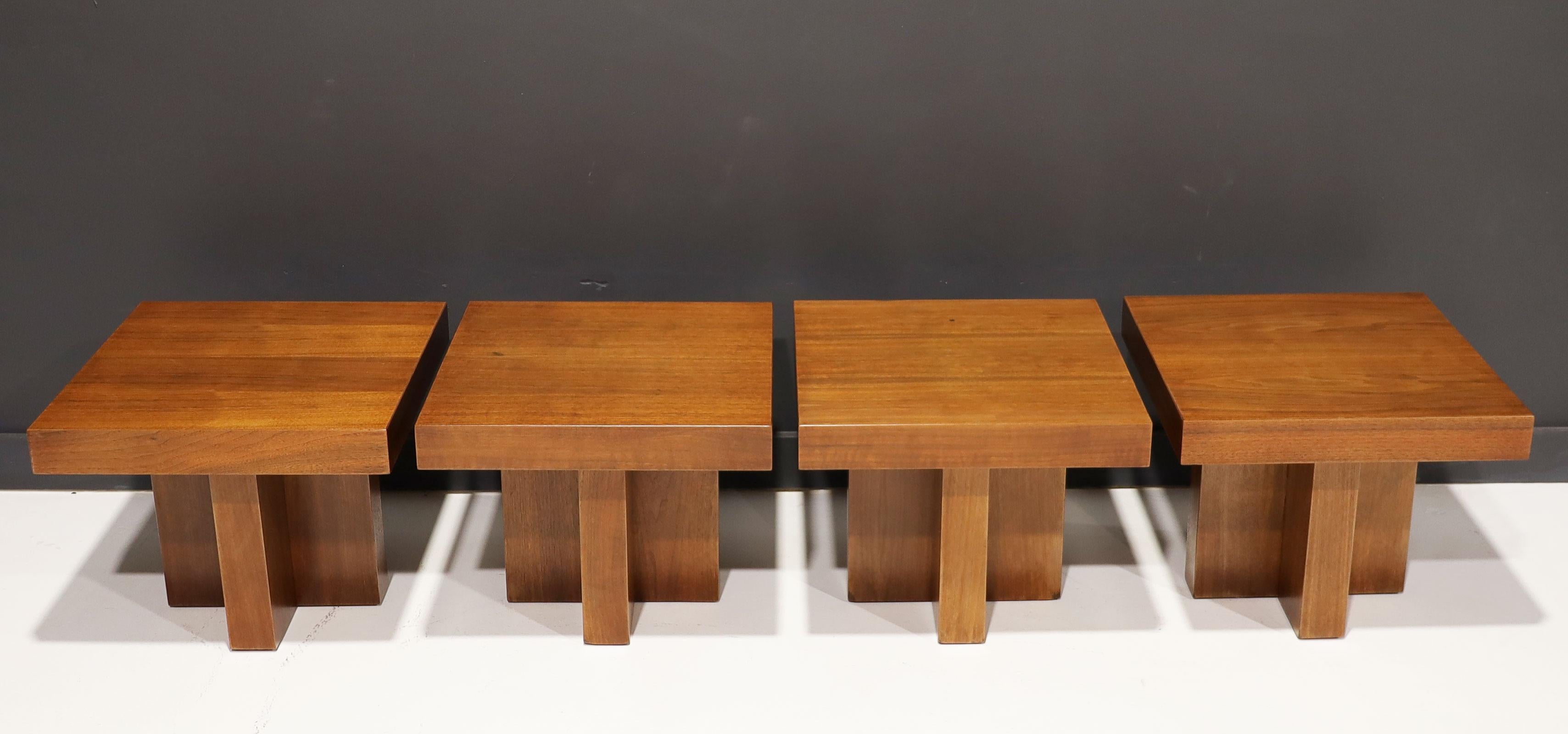 A pair of square cocktail occasional tables with refinished walnut tops and bases. In the Style of Milo Baughman, American, circa 1970. Notice we have 4 available.