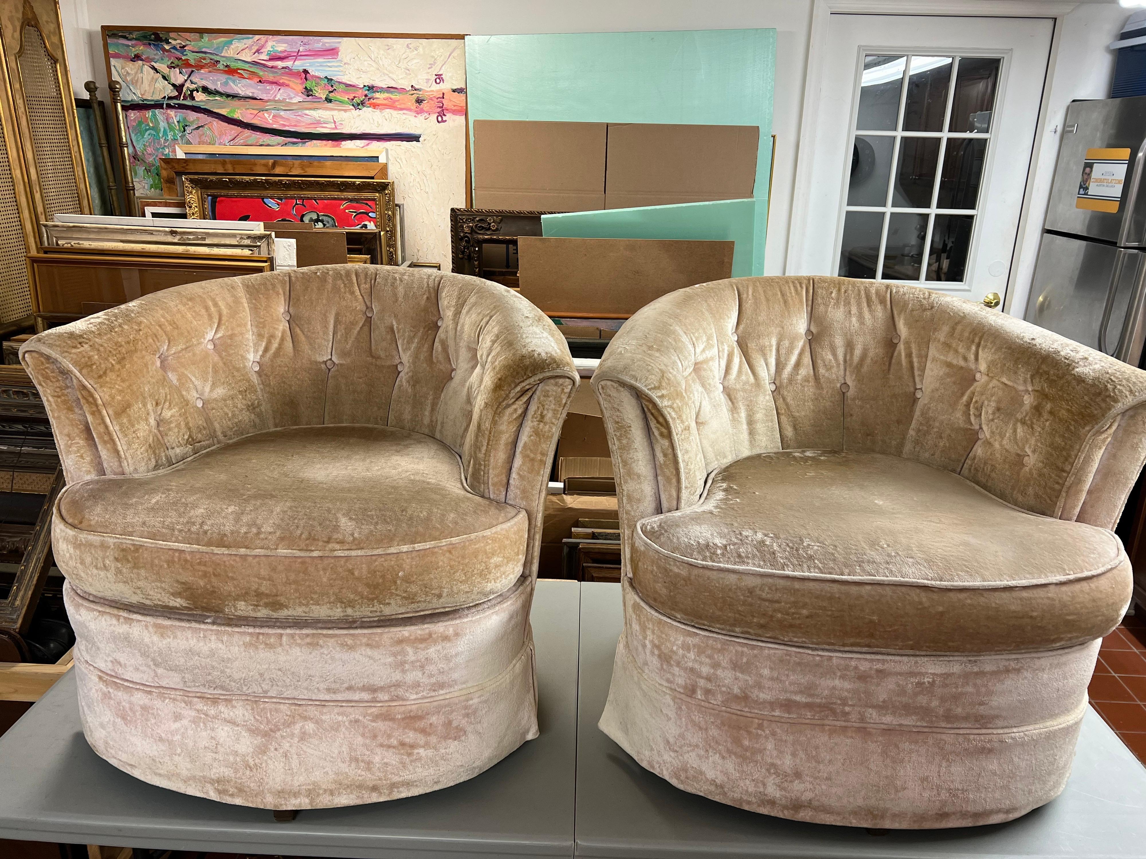Pair of Mid-Century Modern crushed velvet swivel chairs. Fabulous high glam chairs to accent any room. Low profile back and classic shape. Use as is or recover. Soft Champagne color.
Measures:
seat depth is 20
