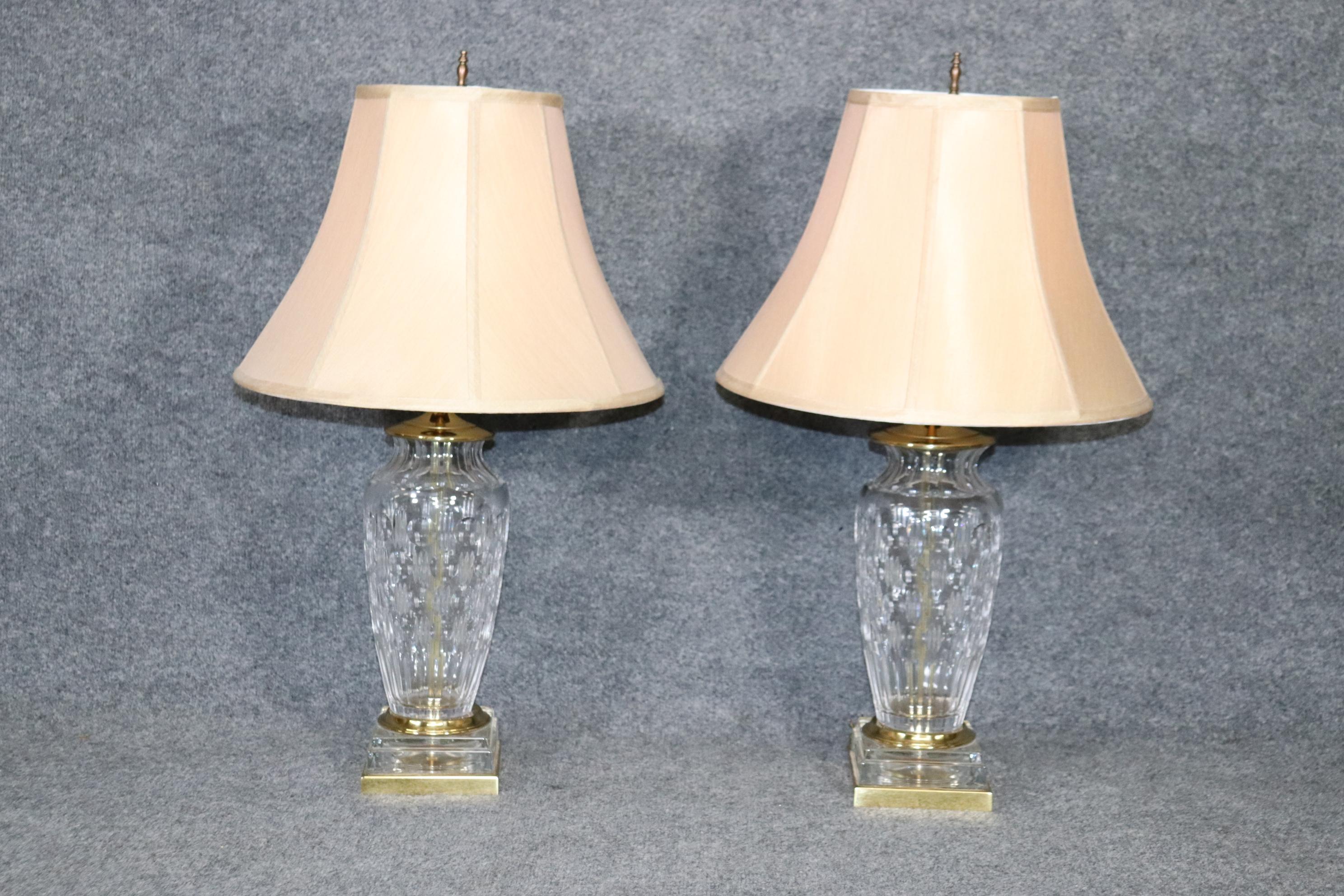 Dimensions- H: 29 1/4in W: 5 3/4in D: 5 3/4in Shade Diameter: 17in
This pair of crystal and brass lamps attributed to waterford are made of the highest quality and are bound to add a nice touch of modernism and minimalistic luxury into your home or