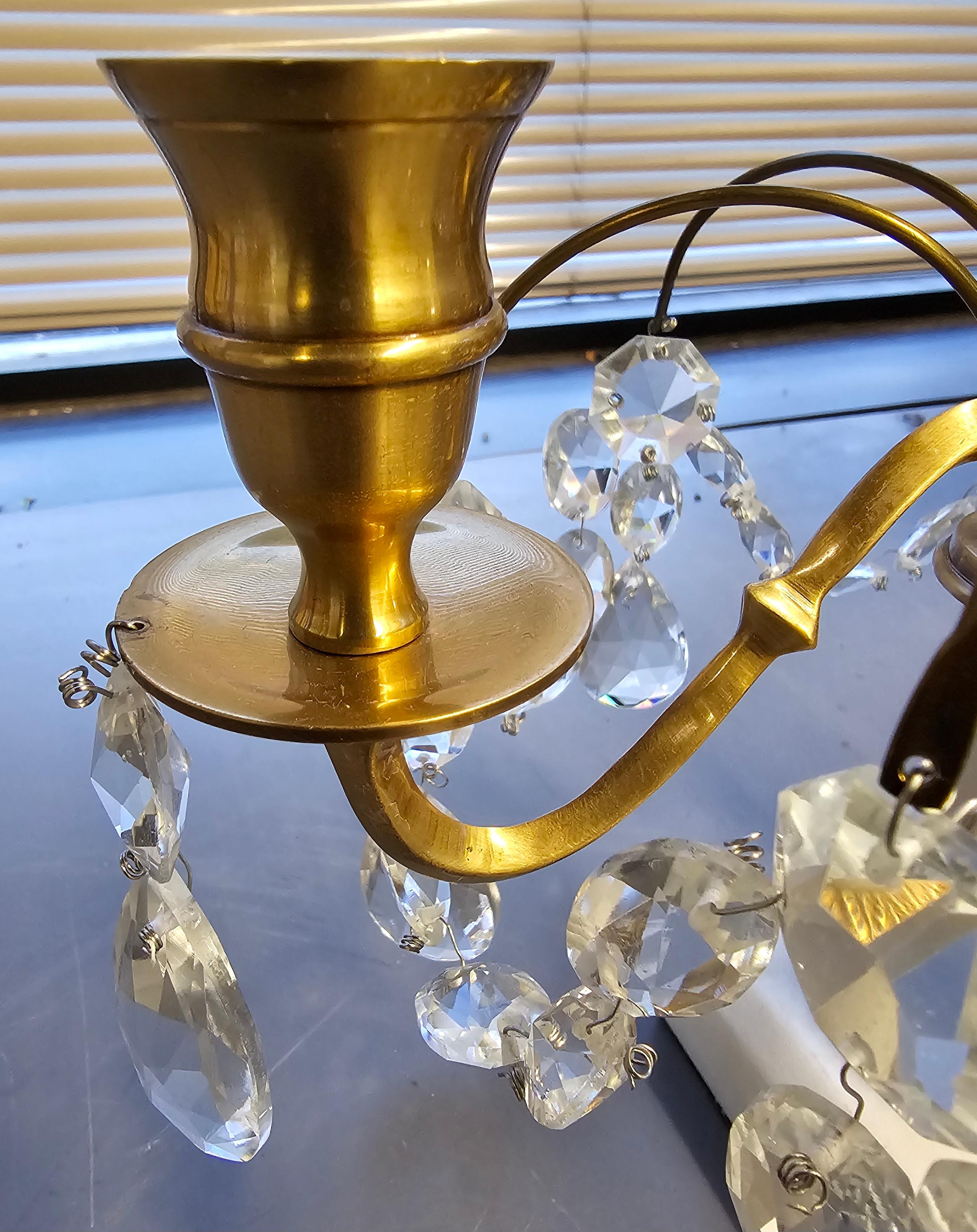 20th Century Pair Of Crystal And Brass Two Light Candle Table Sconces on Marble Plinth  For Sale