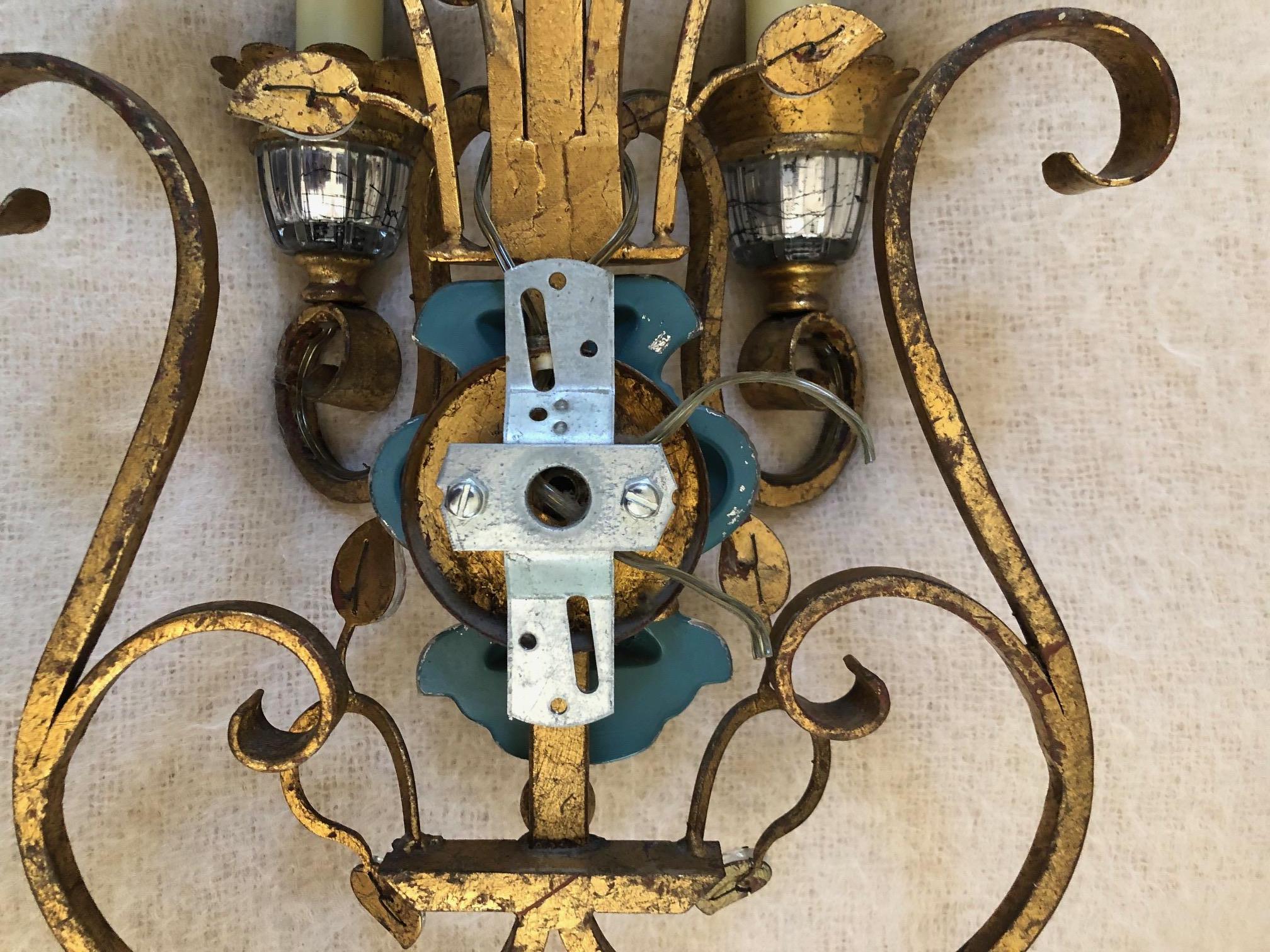 Mid-20th Century Pair of Crystal and gilt iron Italian Sconces by G. Banci For Sale