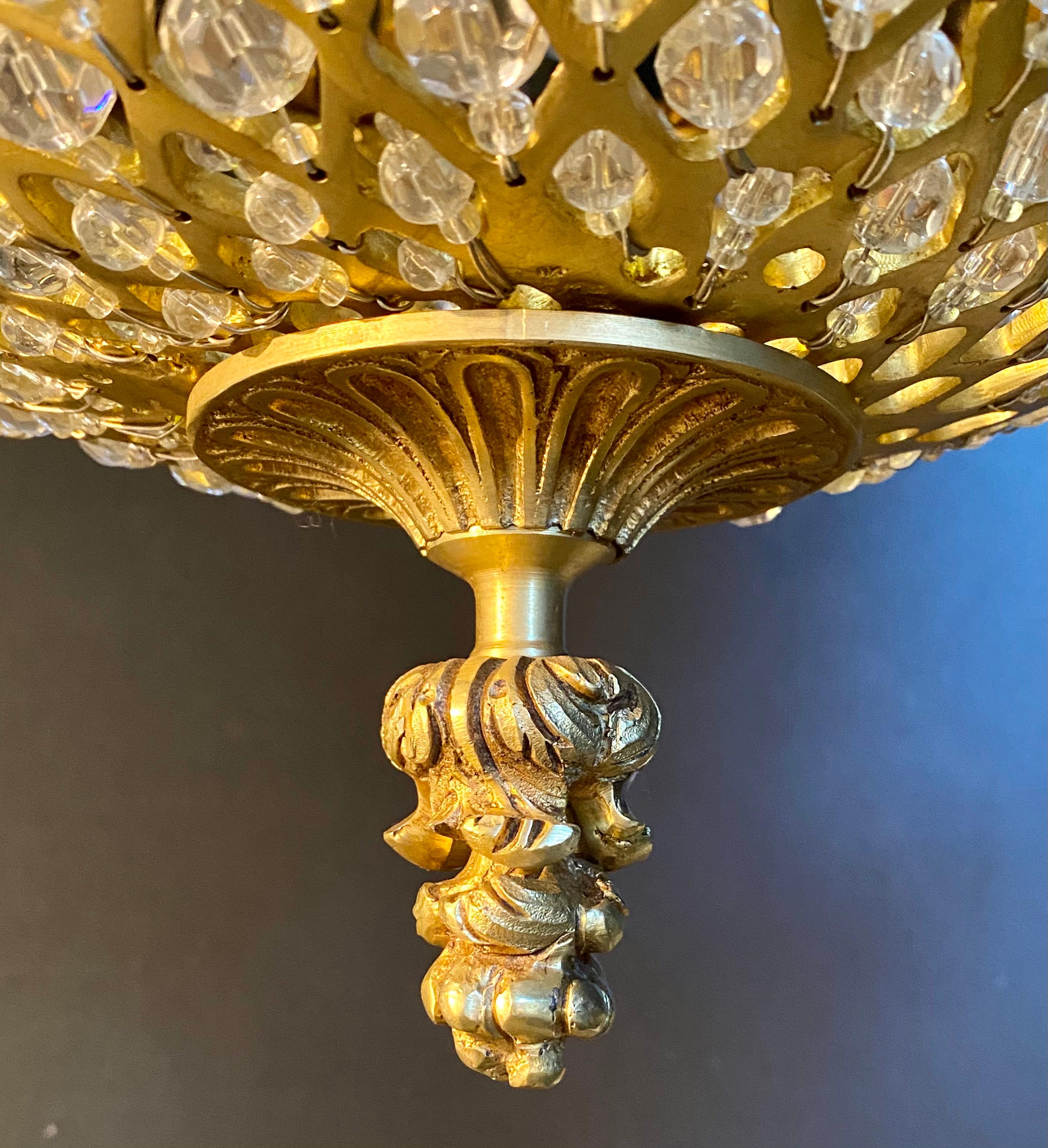 Pair of Crystal Beaded Globe Dore and Patinated Bronze Cherub Form 15-Light 7