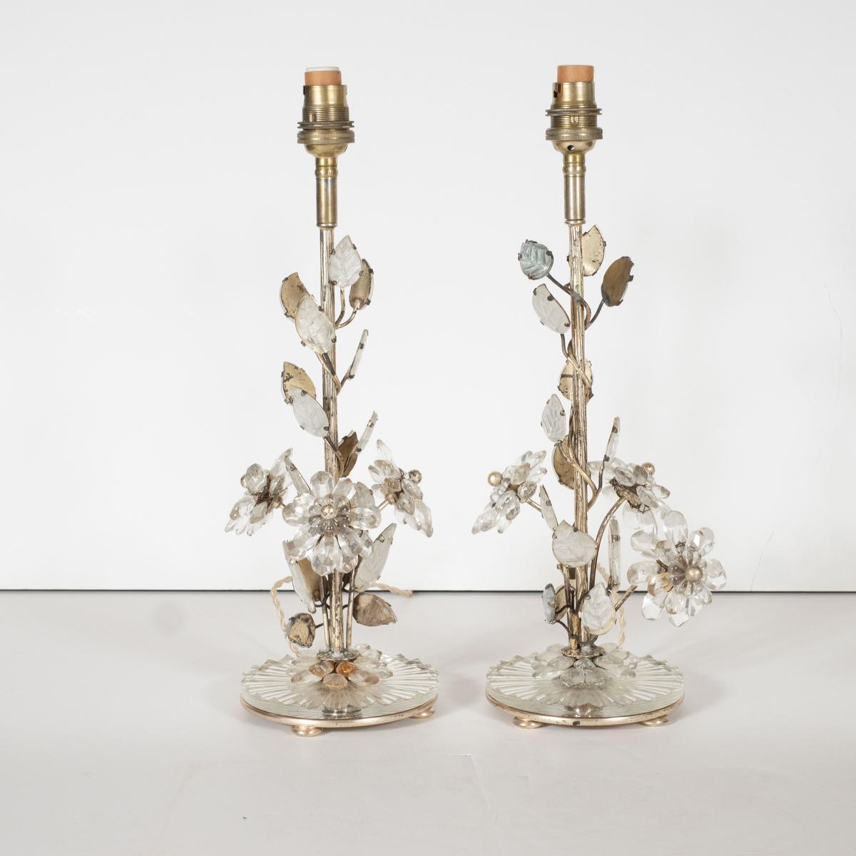 Pair of petite silver plated brass and crystal table lamps with floral motif and silver leaf details. Signed AM.