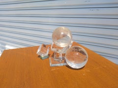 Pair of Crystal Globes on Lucite Stand and Etched Cube
