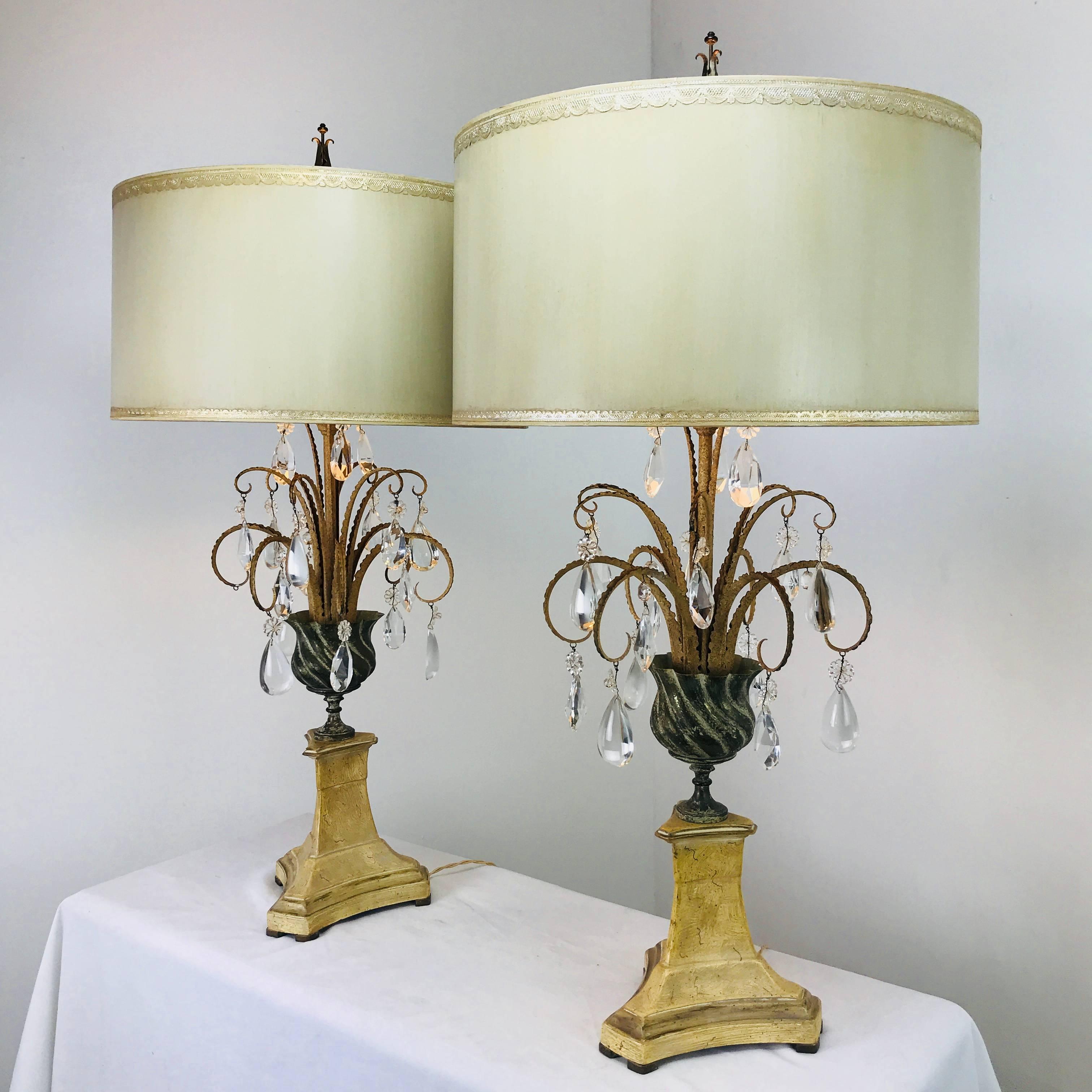 Pair of crystal lamps. These lamps are in good vintage condition with wear due to age and use. 

Dimensions:
9