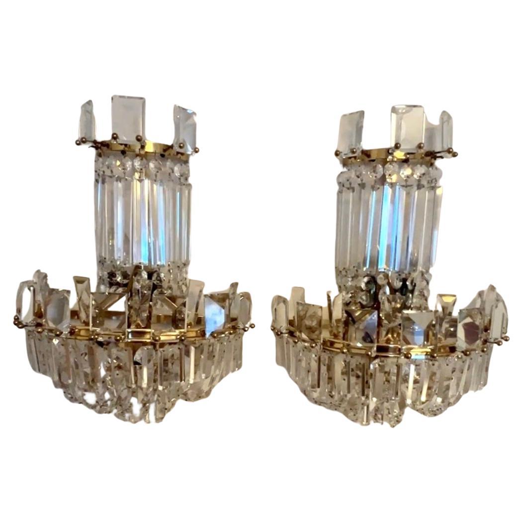 Pair of Crystal Mid Century Wall Sconces.  The pair are stunning when turned on, and just as stunning when not lit.  A compliment to many rooms, and especially flanking a doorway in a dining room or formal living room.   The entirety of the sconces