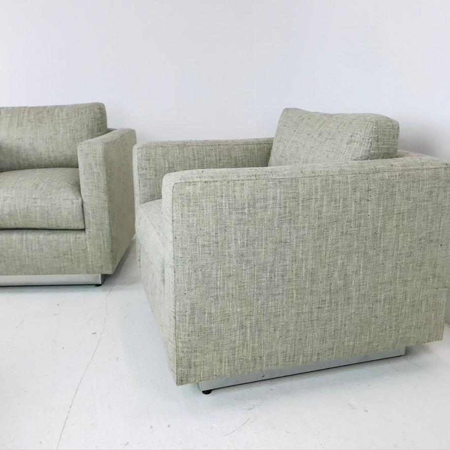 Handsome pair of Milo Baughman style cube chairs on chrome plinth bases. Fresh, new gray tweed upholstery.