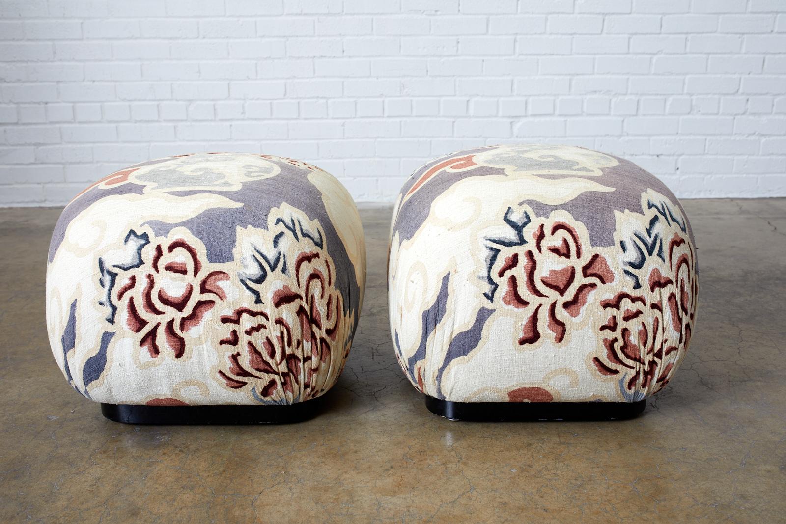 Bespoke pair of cube square shaped ottomans or poufs featuring a modern print linen upholstery. Each ottoman is mounted on a square wooden base with an ebonized lacquer finish. Constructed in Los Angeles for a CA designer with label still attached
