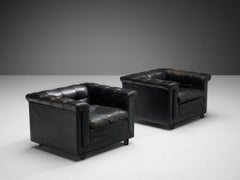 Pareja de tumbonas cúbicas de cuero negro