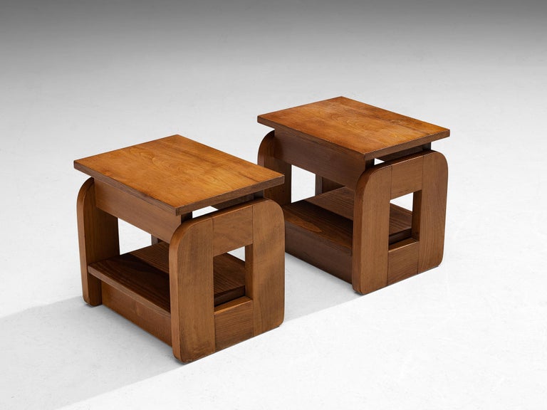 Pair of side tables, beech, Europe, 1970s. 

Geometric shaped side tables composed of solely cubic forms. Geometry is at the forefront of these pieces, expressed through clear lines and symmetrical features. The wooden tops are based on a square